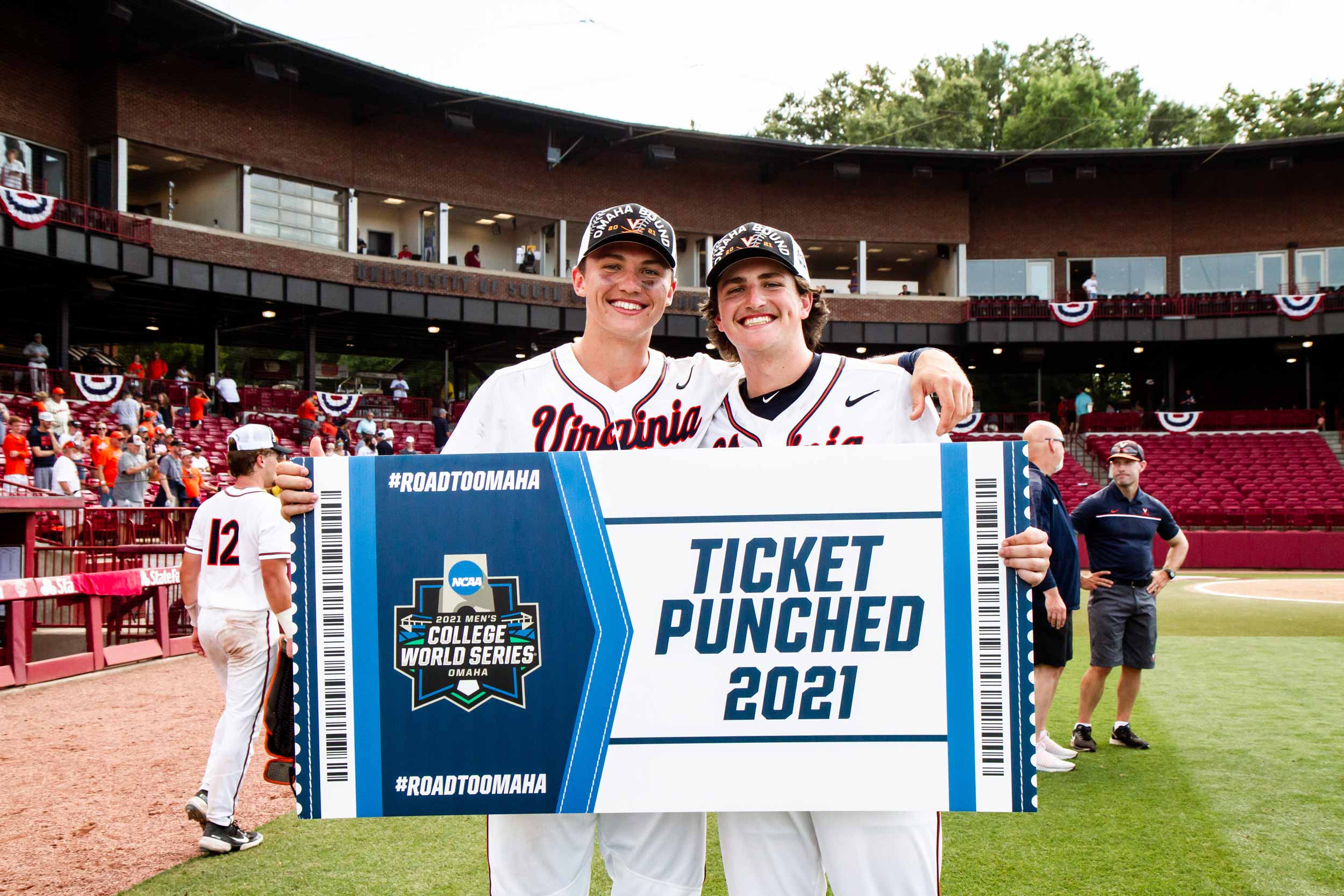 Zack, left, and Jake Gelof holding a Ticket Punched sign 
