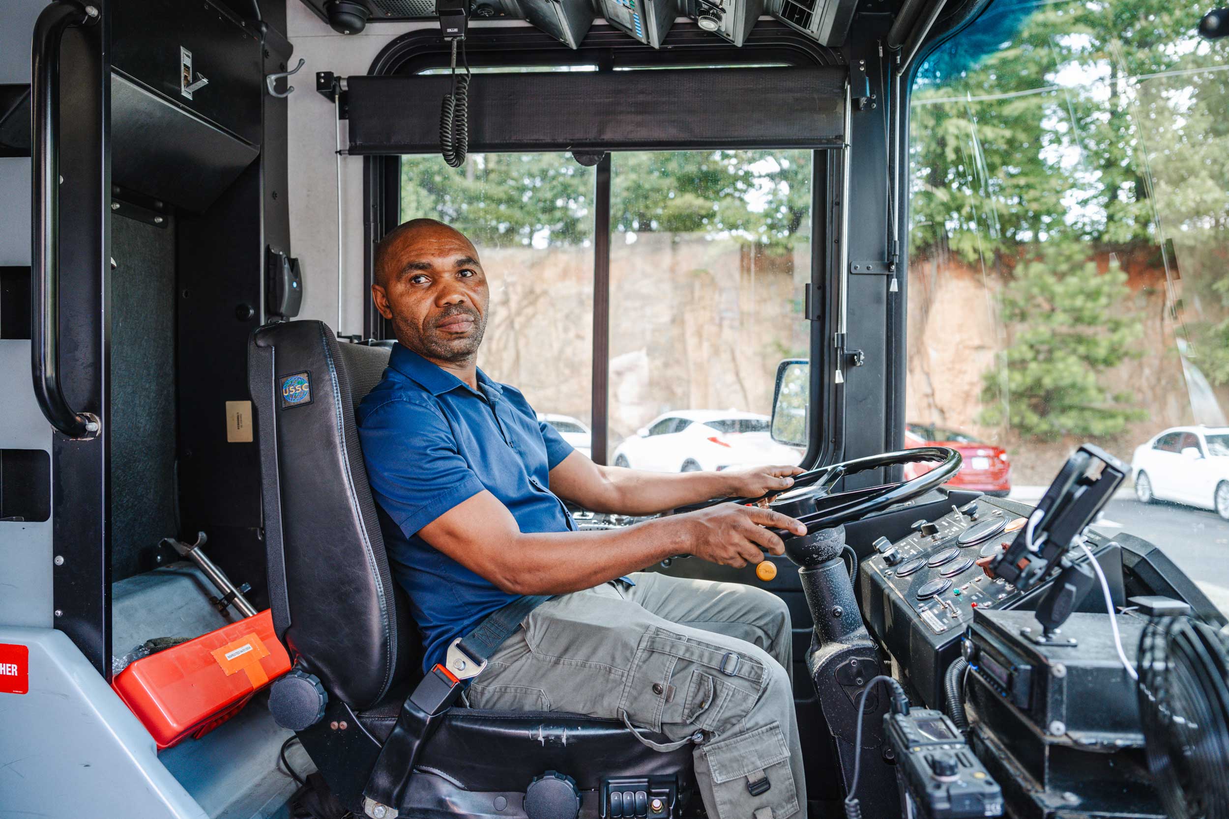 Portrait of Joseph Ngoma taken while he was driving the University Transit Service Bus.