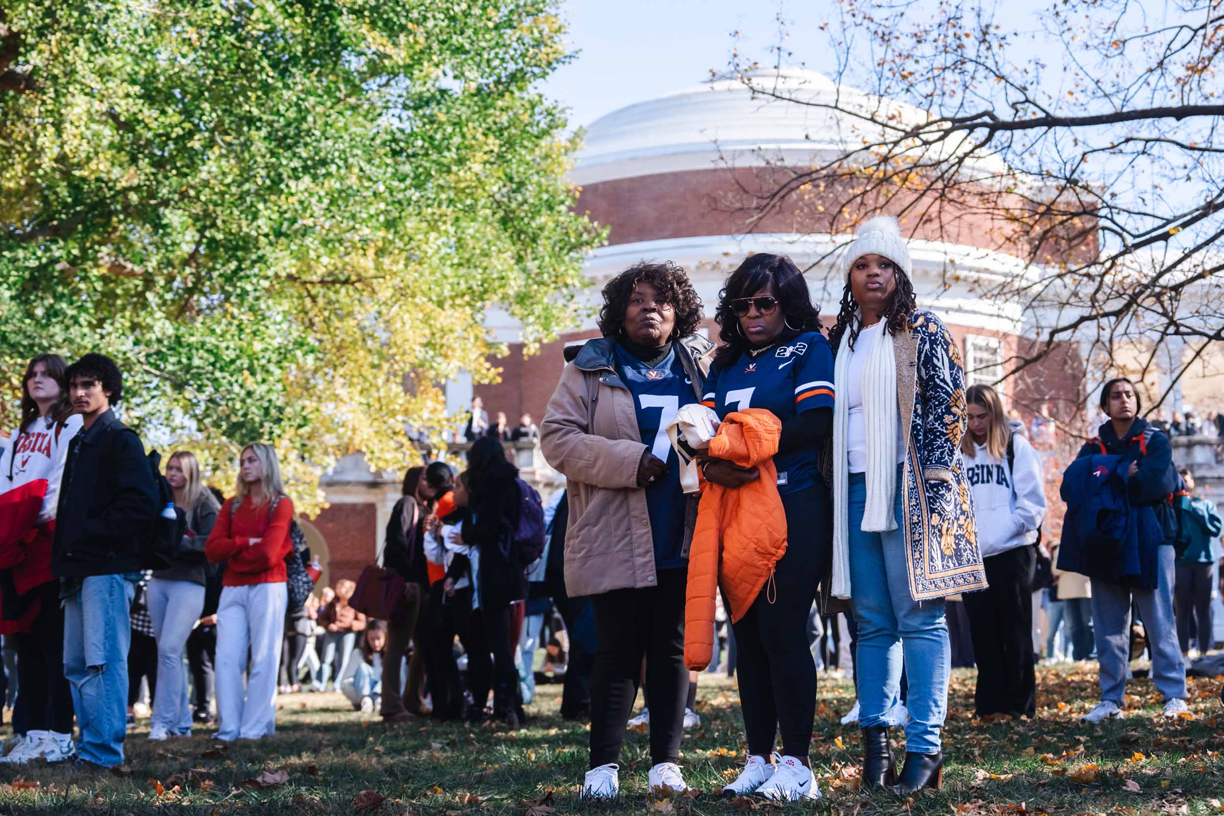 Members of the UVA community standing on the Lawn in mourning