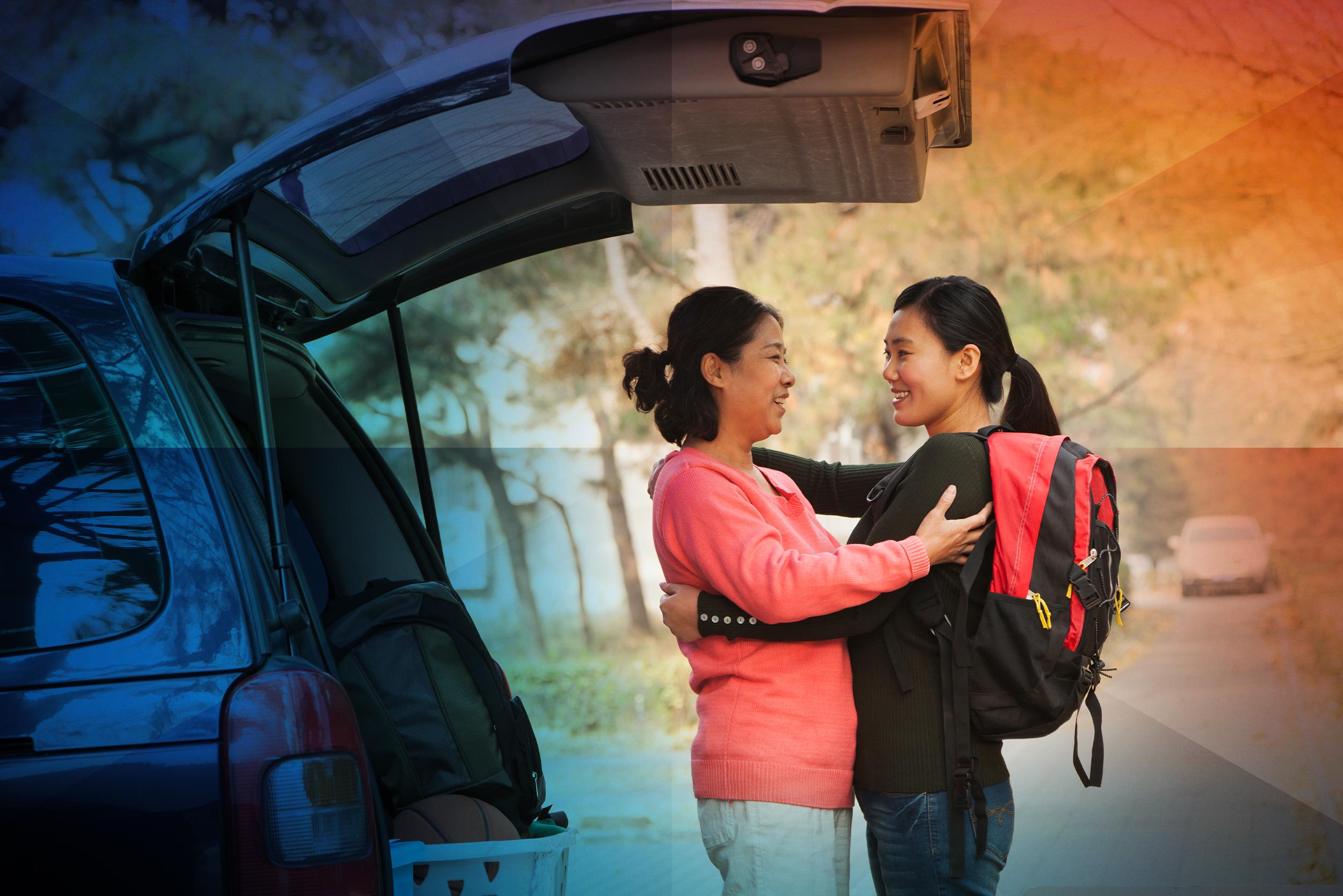 Portrait of a mother hugging her daughter goodbye as she leaves for school.