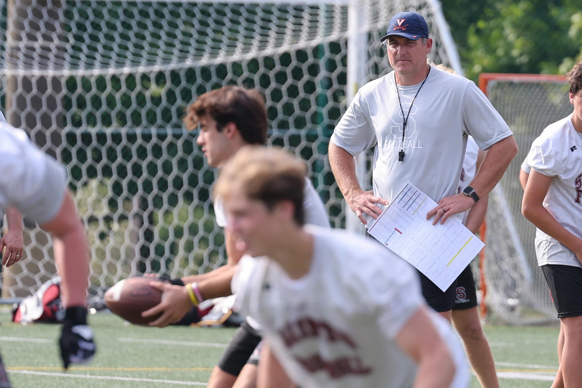 Candid Portrait of Former UVA star Heath Miller with other football player.