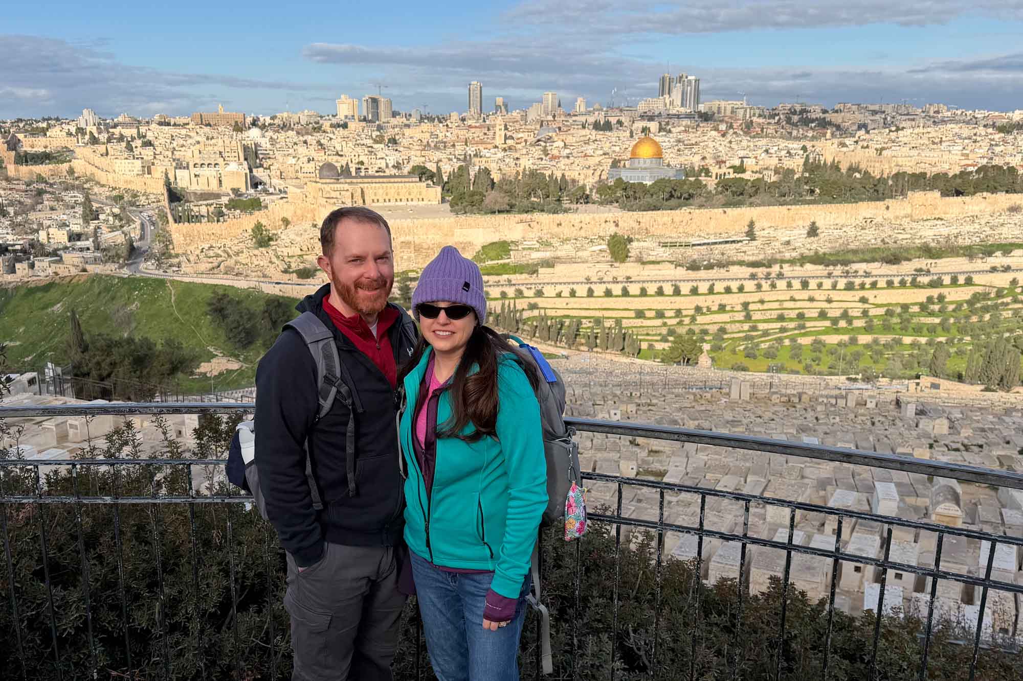 Portrait of Matt and Brittany Dooley pose for a photo on the Mount of Olives.