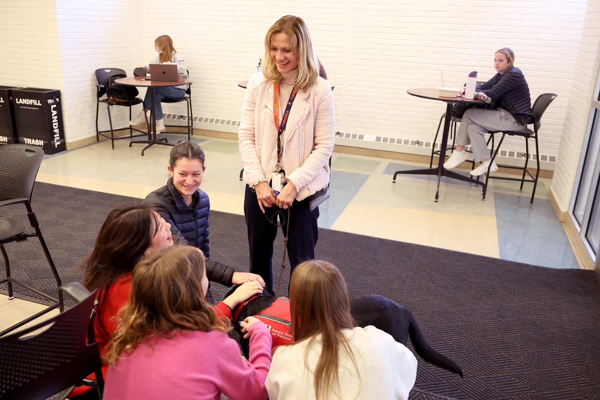 Portrait of Beth Quatrara discussing with her nursing students.