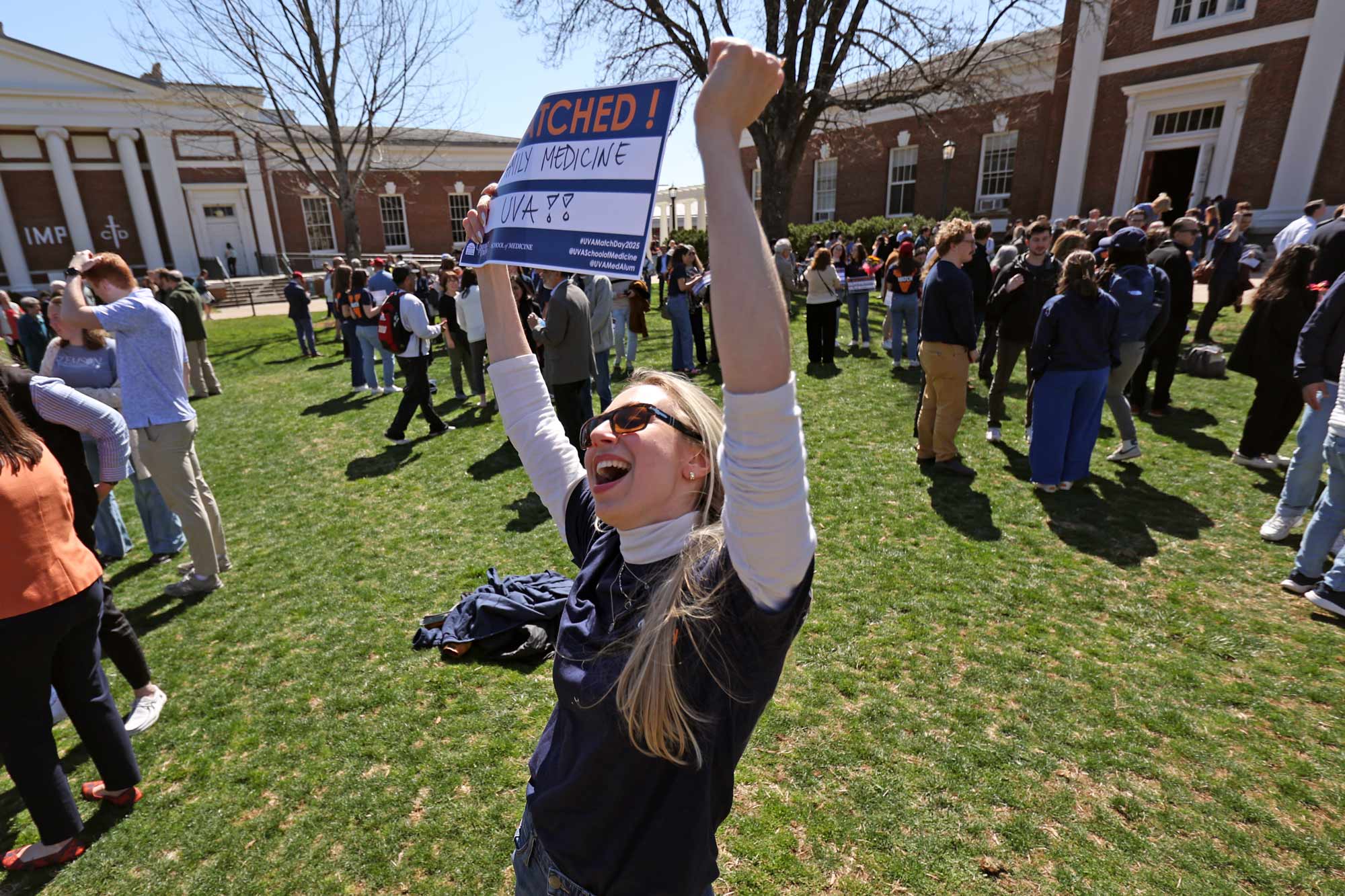 Giorgia Borgarelli holding up a sign showing her Match