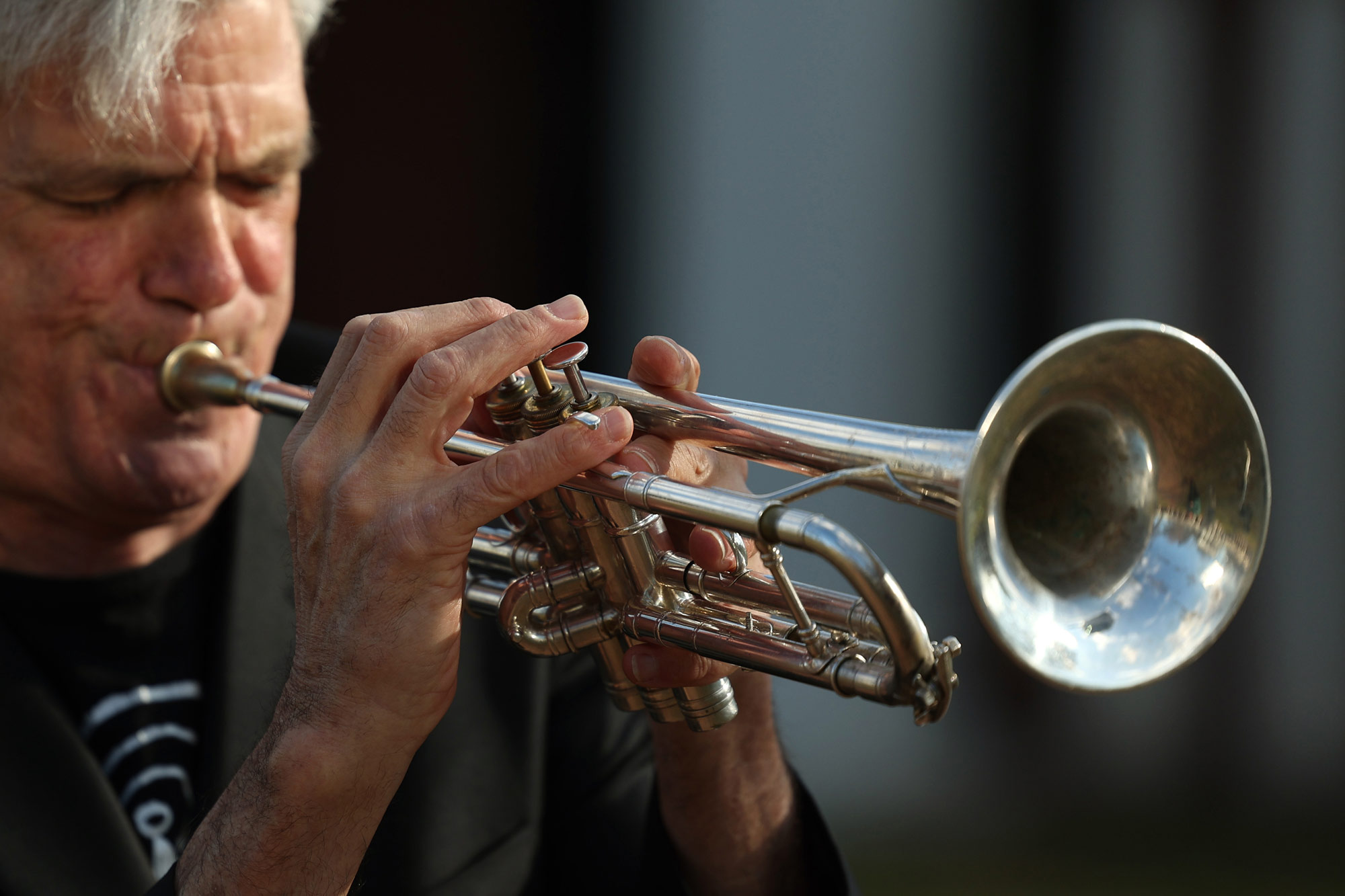 A close up of D’earth improvising a trumpet riff