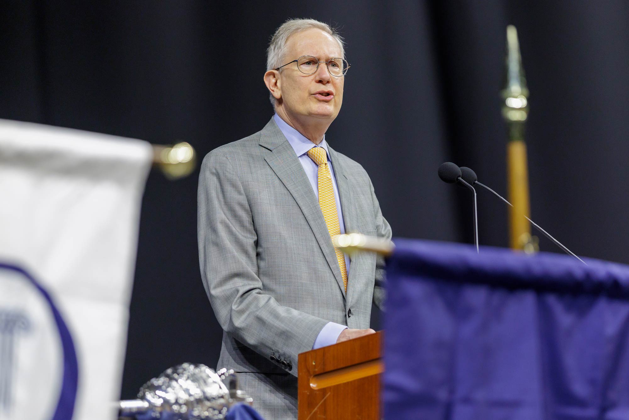 Portrait of Interim President Paul Mahoney addresses the crowd at the Opening Convocation ceremony.