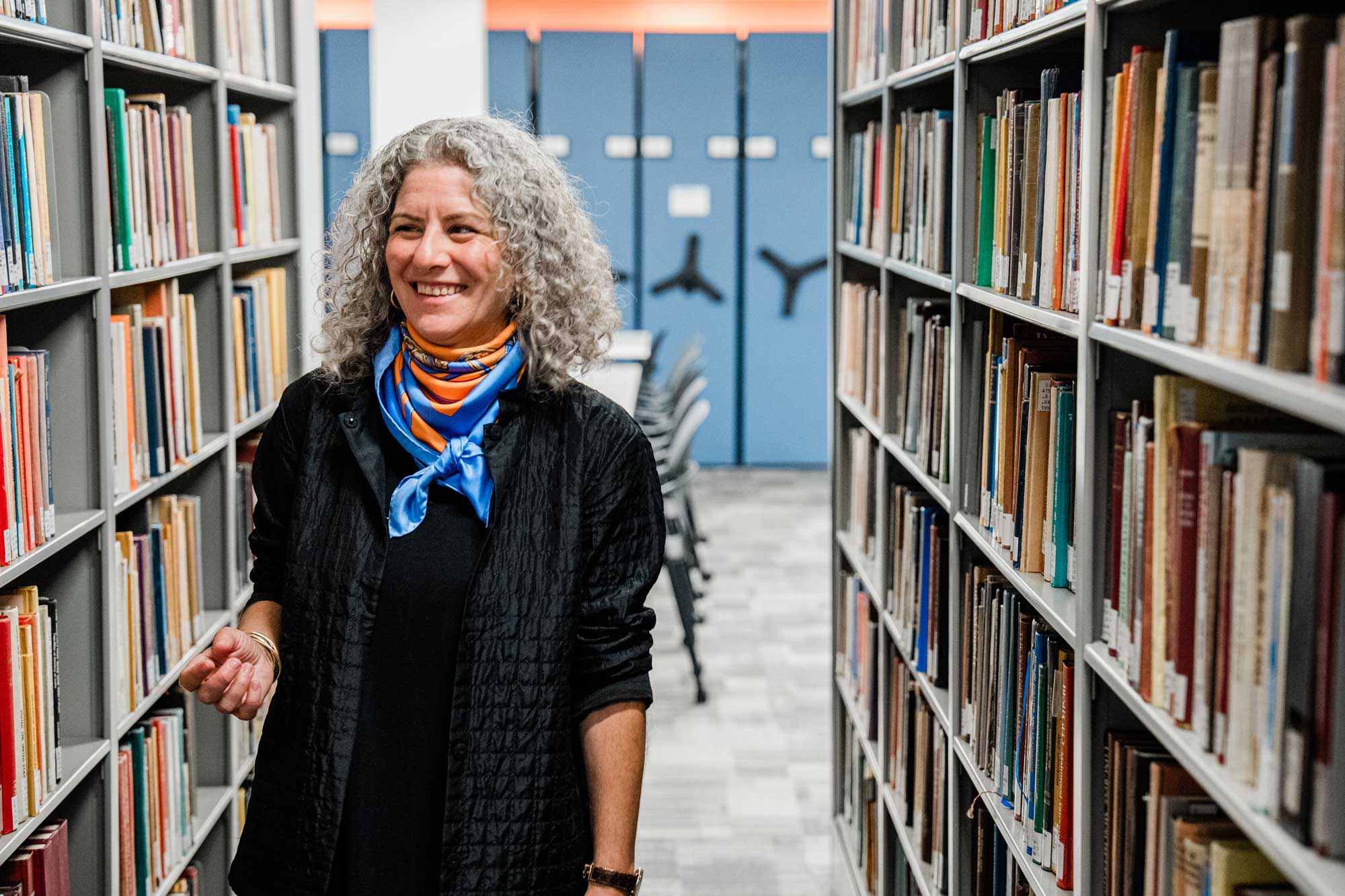 Portrait of Melanie Ann Egorin in a library
