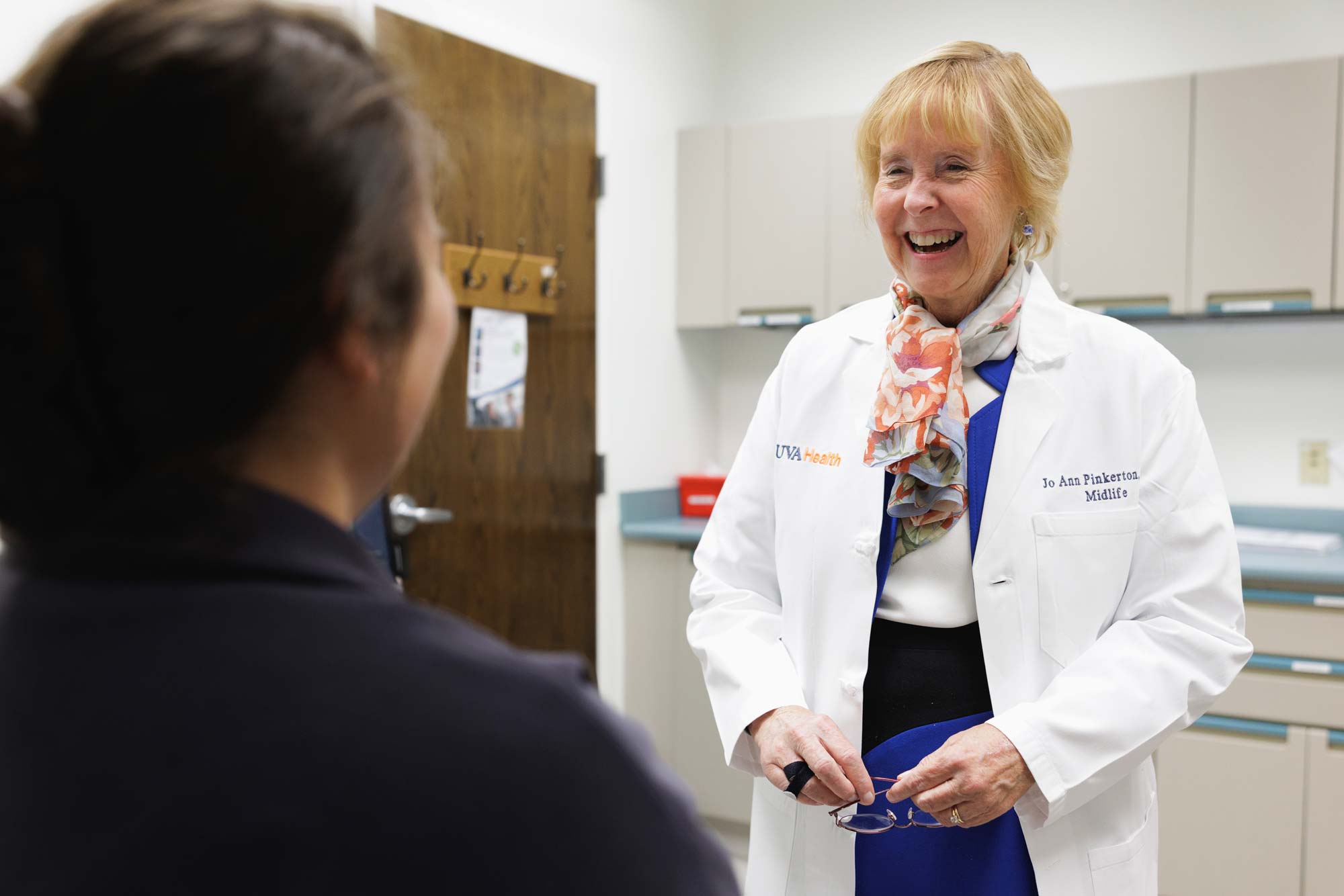 Dr. Pinkerton seeing a patient in the exam room at UVA Medical Center