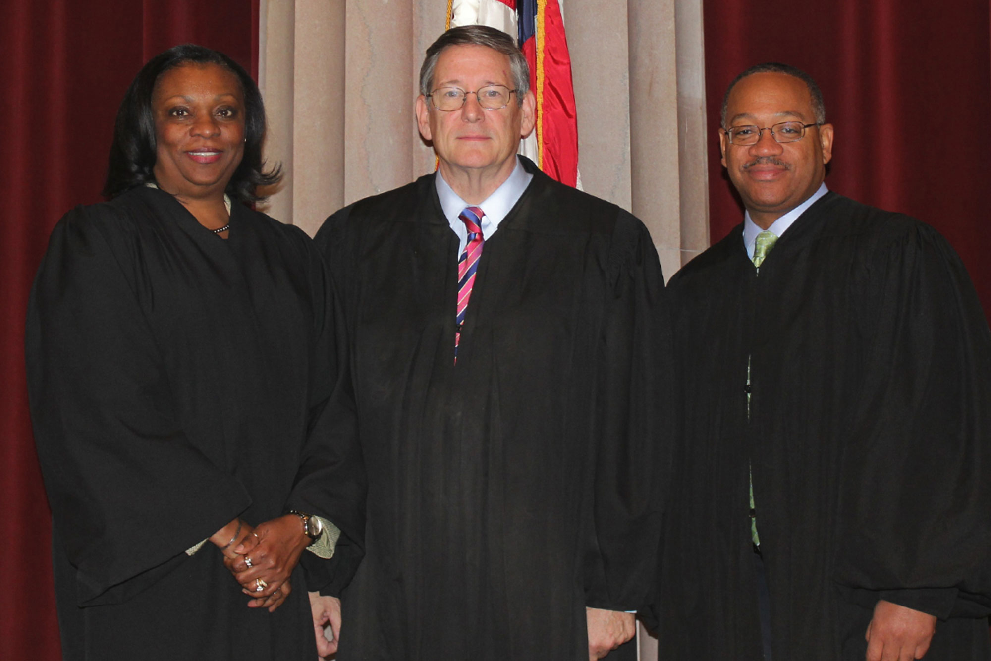 Justice Cleo E. Powell, Justice Donald Lemons and Justice S. Bernard Goodwyn pose for a photo together