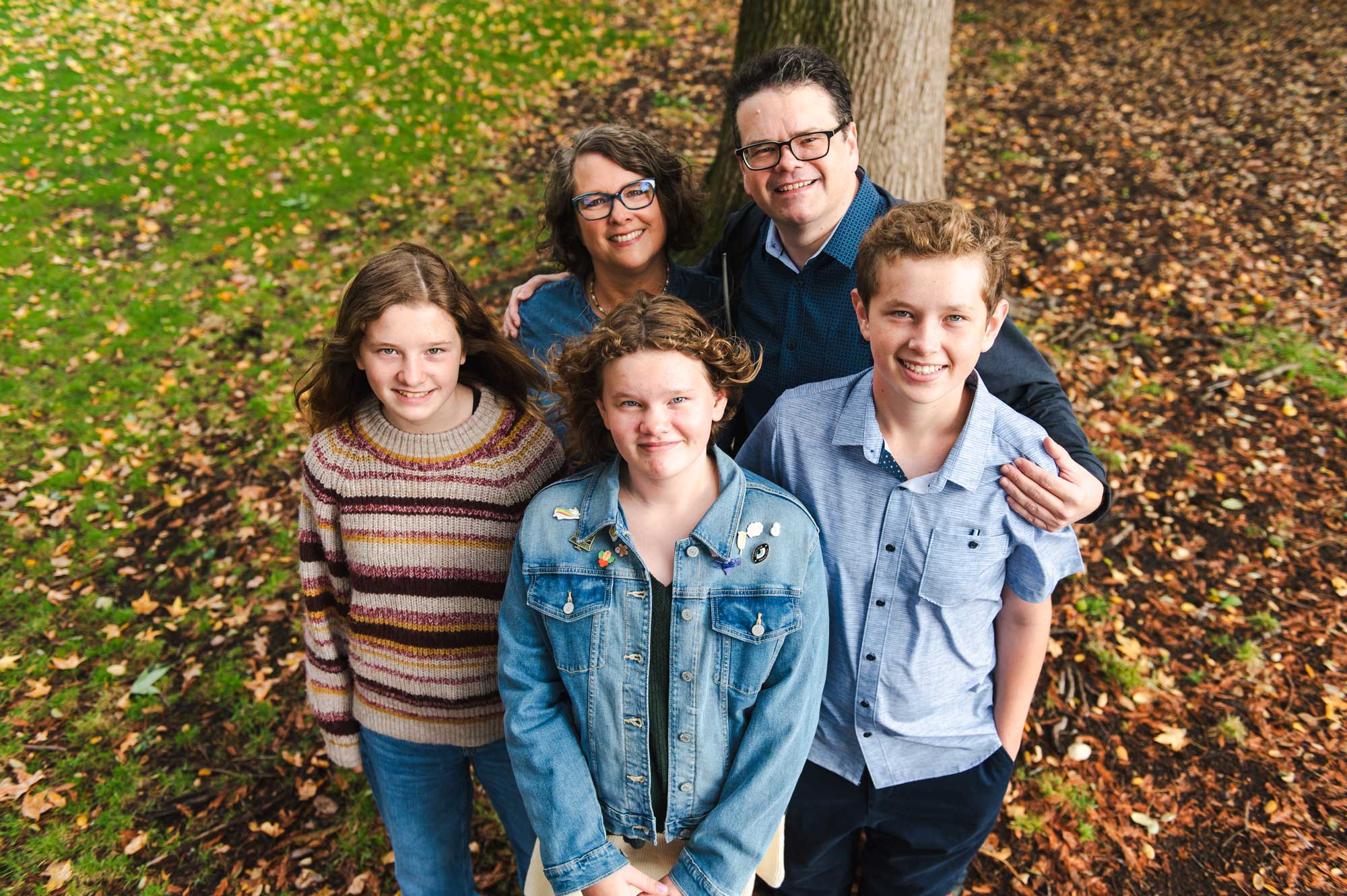 Atwood poses with his wife Besty, daughter Maisie, left, who goes by Raisin, daughter June and son Henry.