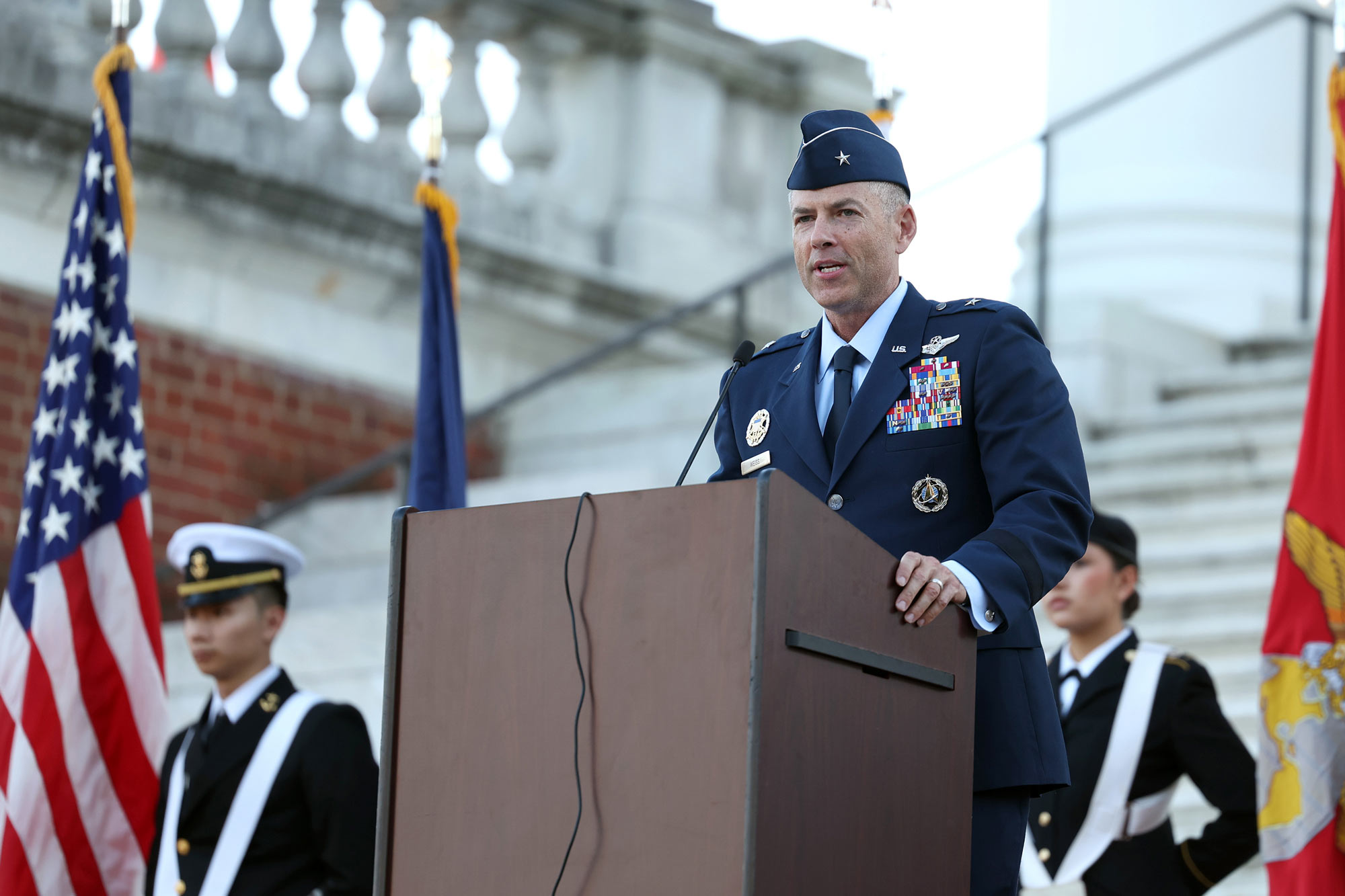 U.S. Air Force Brig. Gen. Geoffrey F. Weiss at the podium speaking