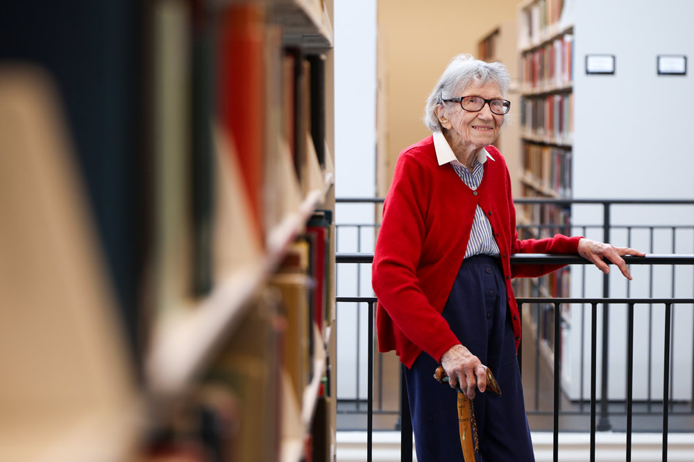 Mary Catherine Dunnigan in the UVA Shannon Library stacks