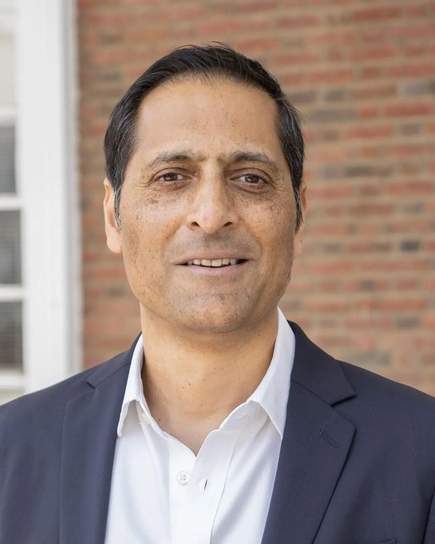 Portrait of Manoj Patel smiling at camera.