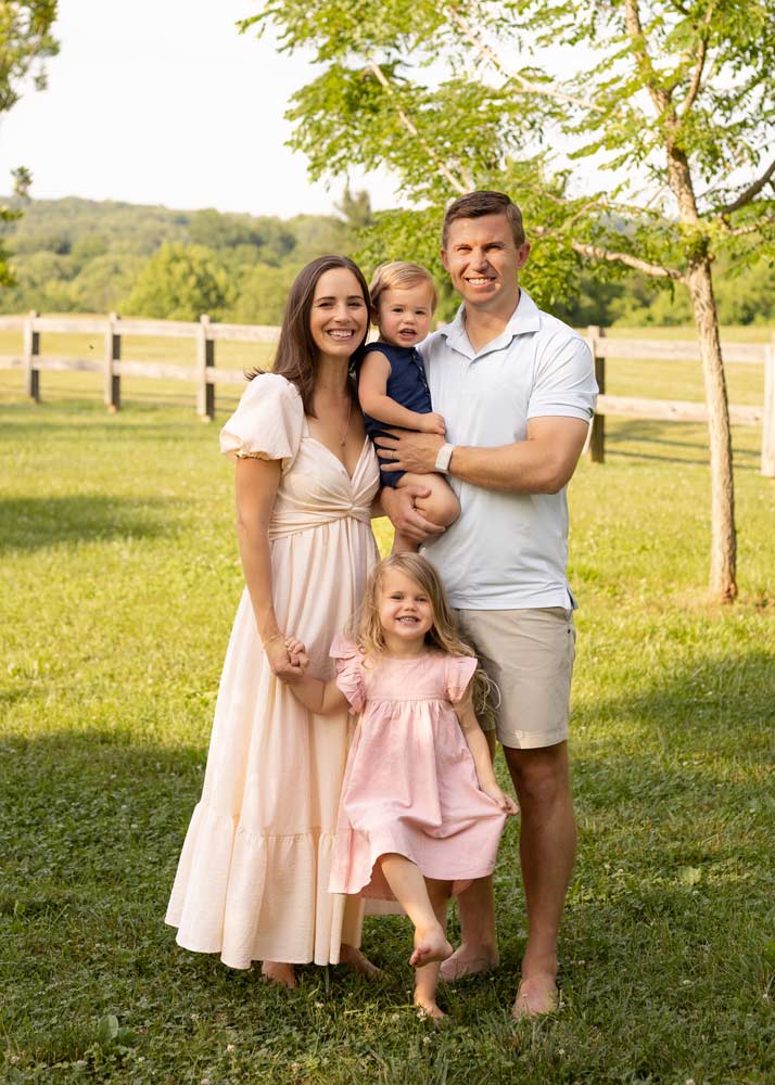 Matt Ganyard and his wife, Marie, pose with their children