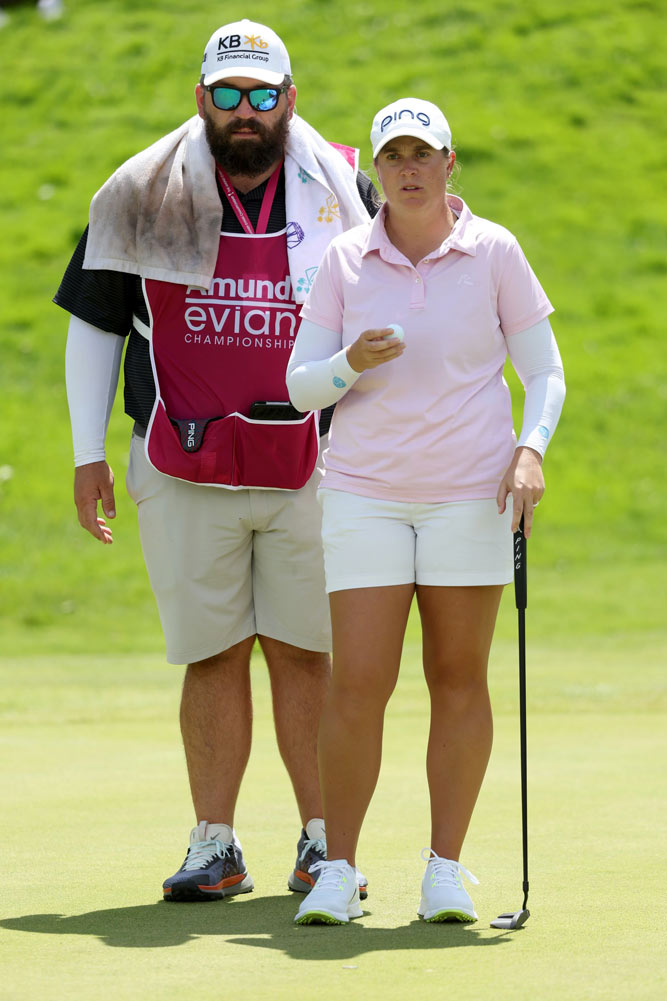 A portrait of UVA alumni John Pond and Lauren Coughlin on the golf course.