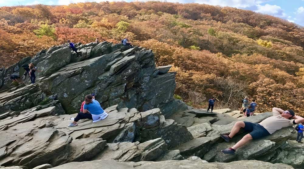 people hiking on Humback Rock in Lyndhurst, Virginia