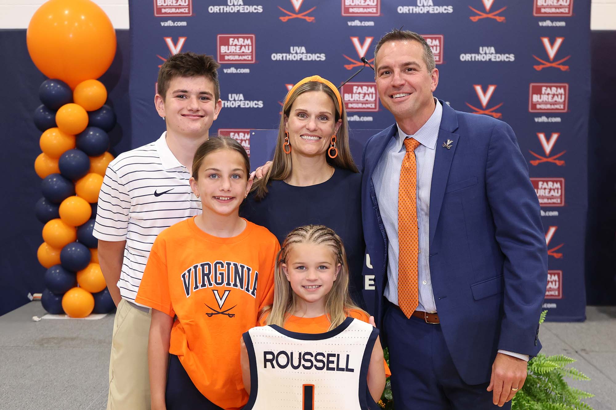 Portrait of Aaron Rousell with his family.