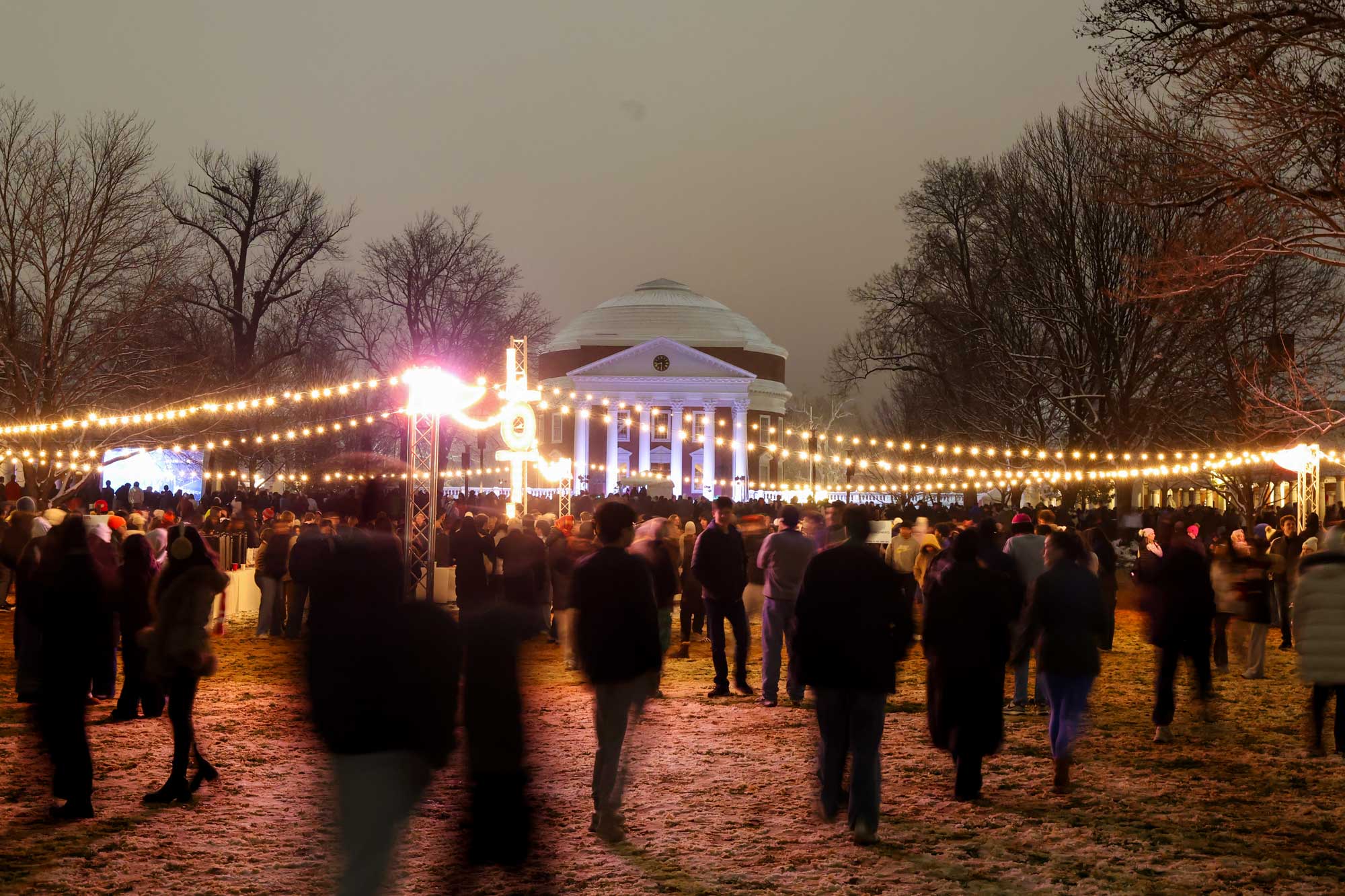 The snow-covered Lawn was filled with University community members taking part in the 25th annual Lighting of the Lawn.