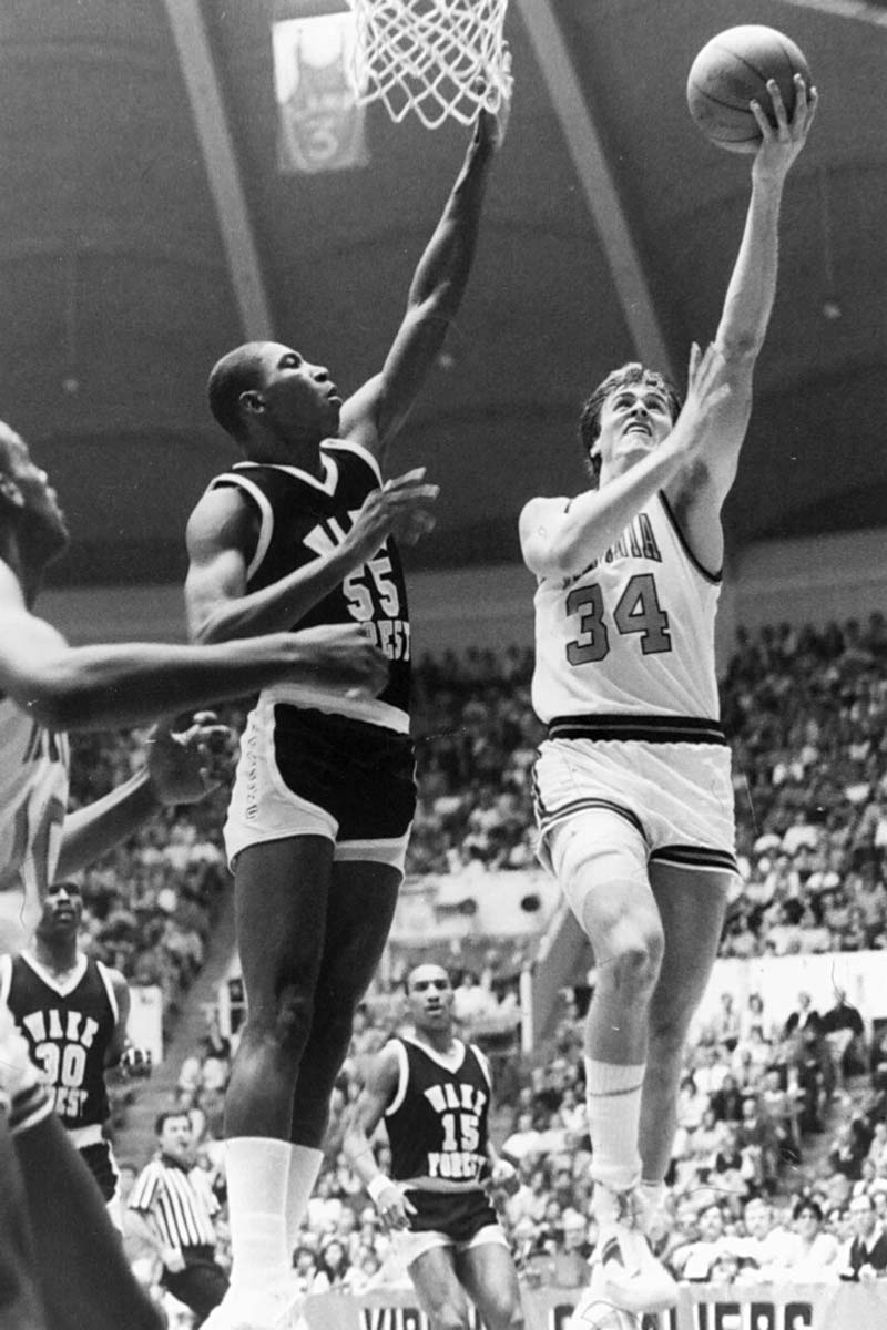 Portrait of Carlisle skies for a layup against a Wake Forest defender.