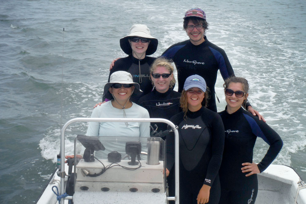 McGlathery and team on a boat