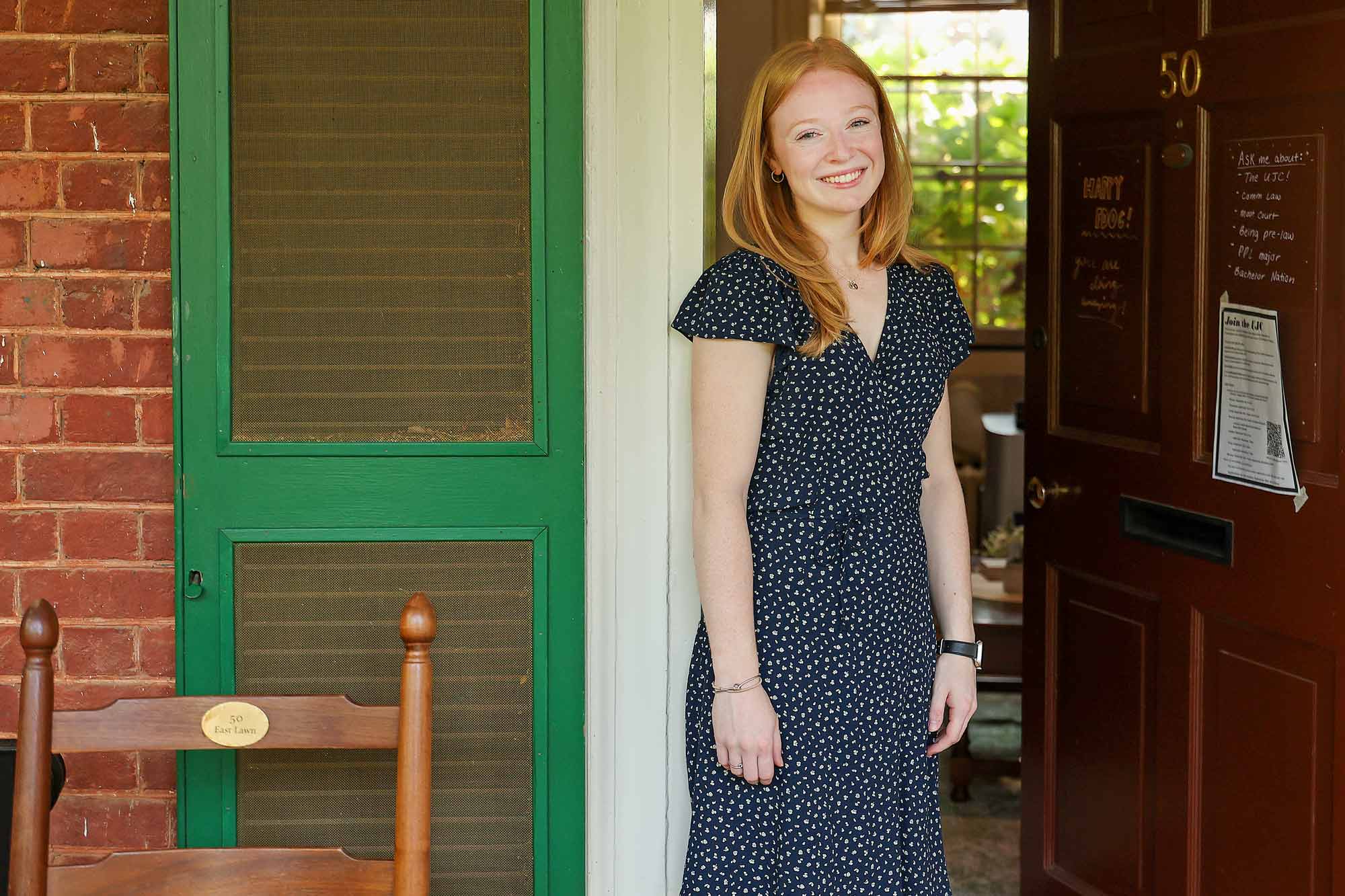 Allison McVey standing outside her Lawn room door