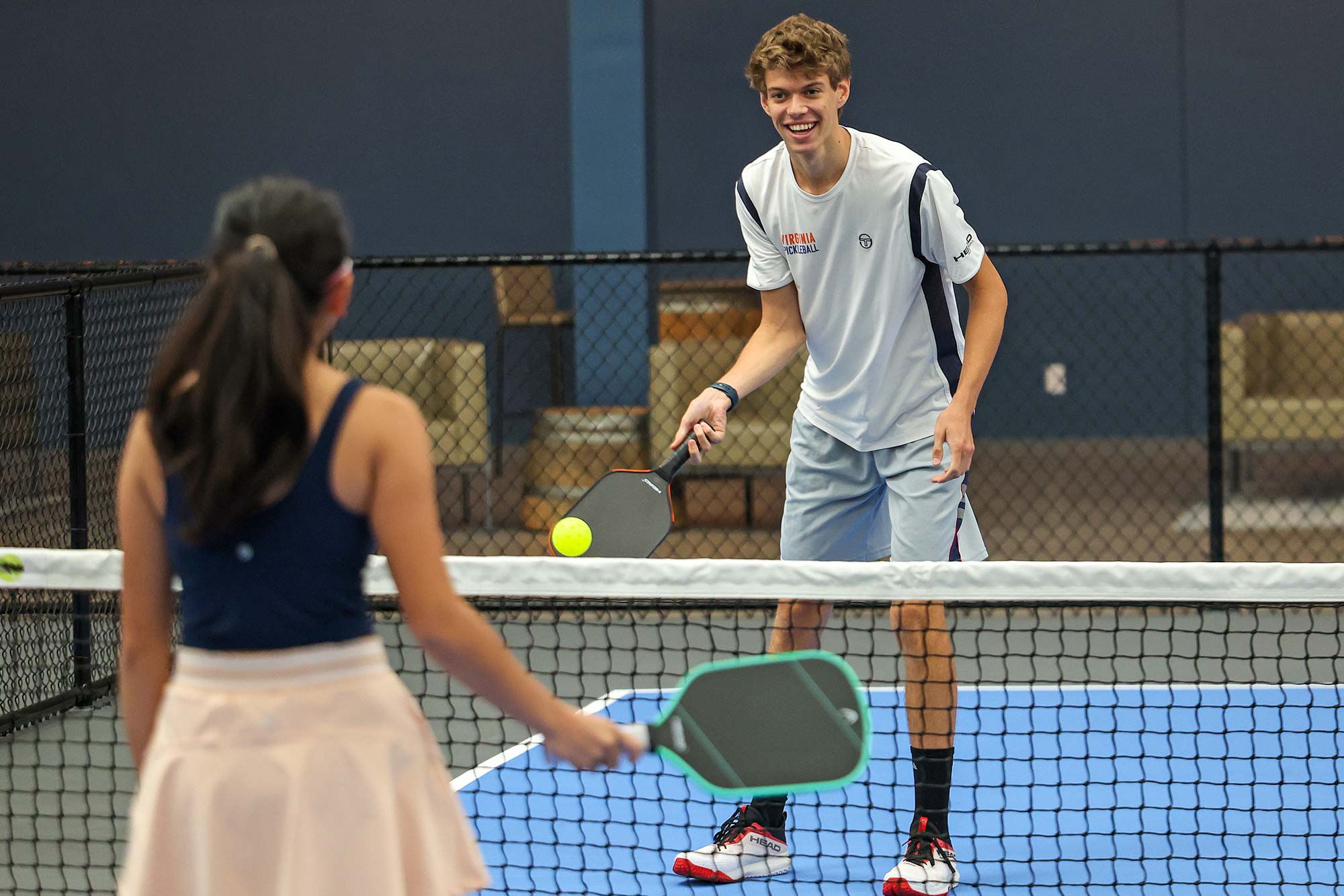 Ngo and Arden Levin playing pickleball at Cville Smash.