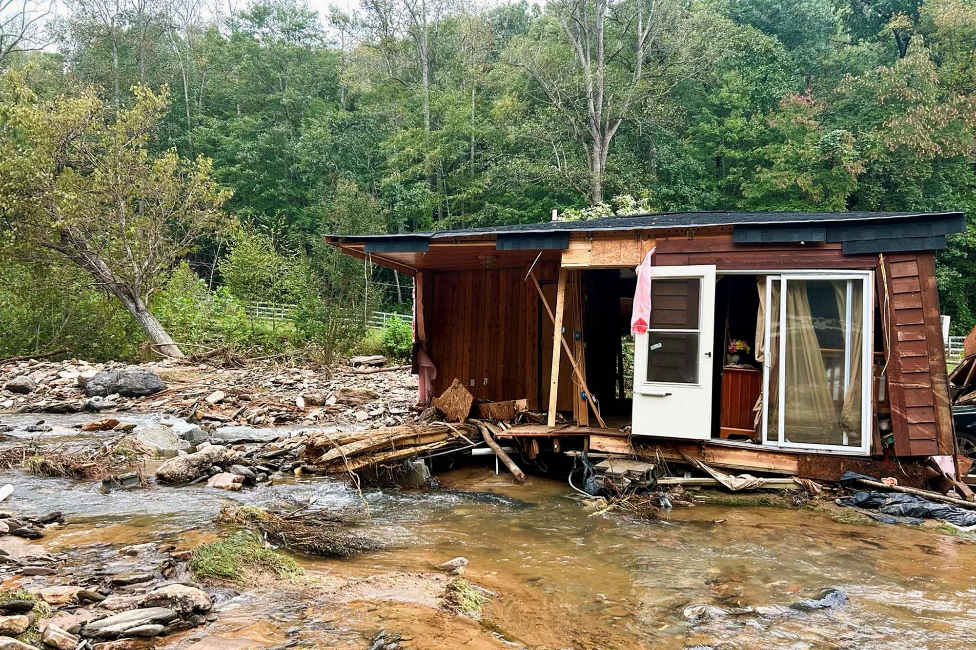 A house washed down a river in North Carolina