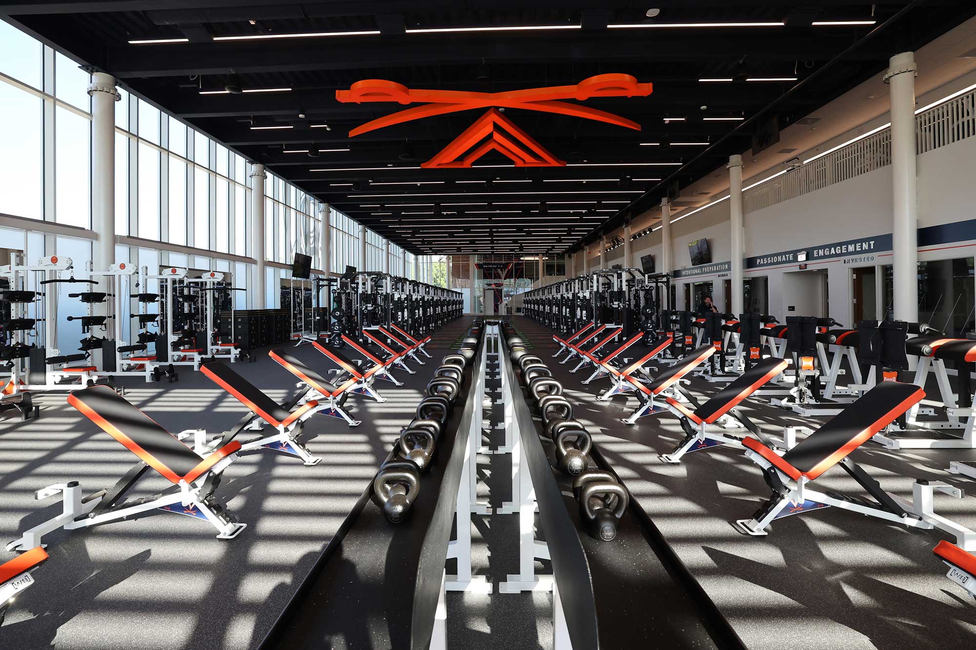 Rows of weight benches in the new Hardie Football Operations Center 