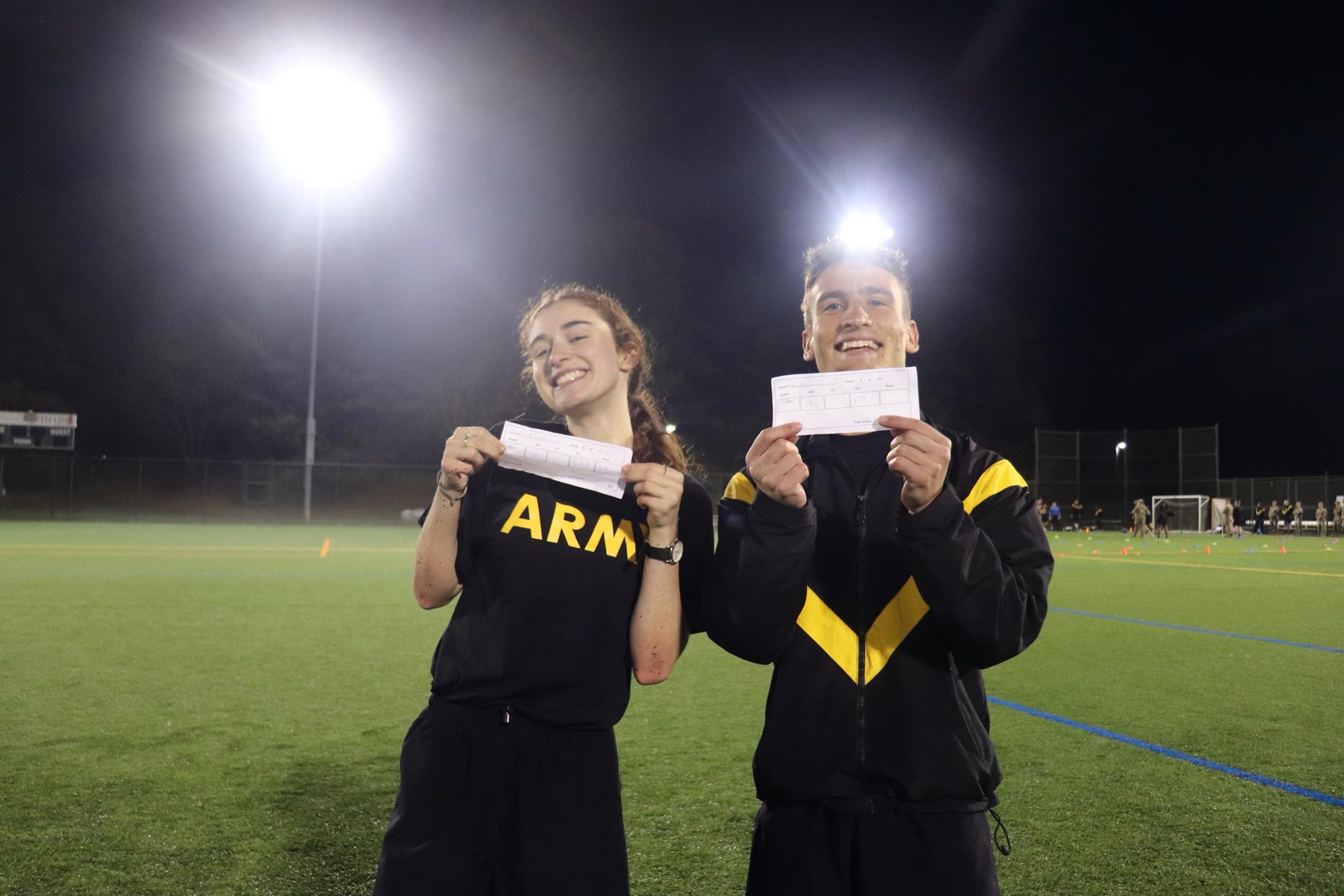 Rebecca Fitch with another cadet showing off their fitness test results