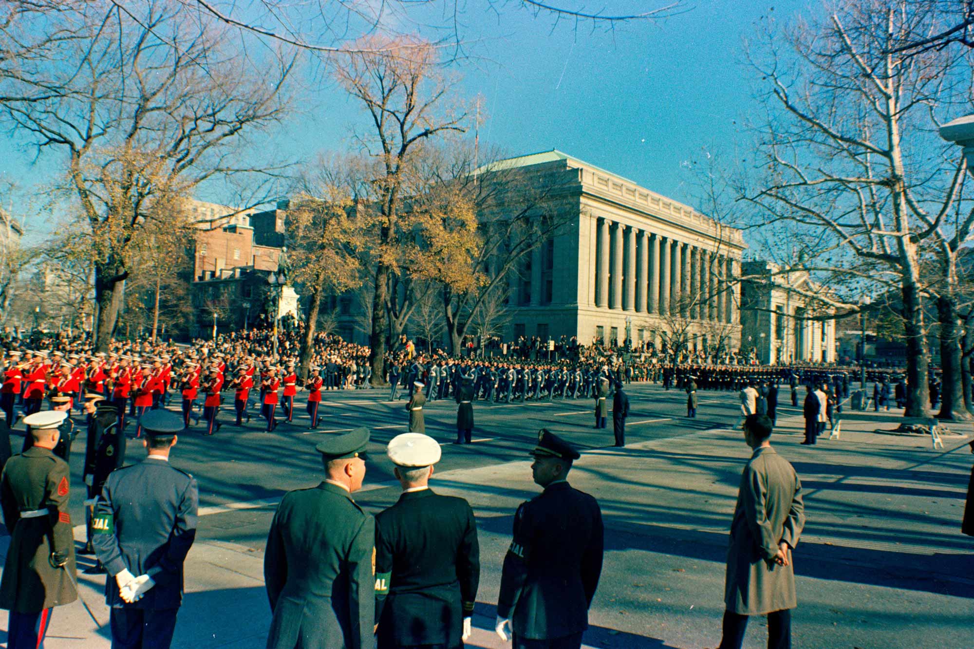 Military honor guards march in JFK’s funeral procession 