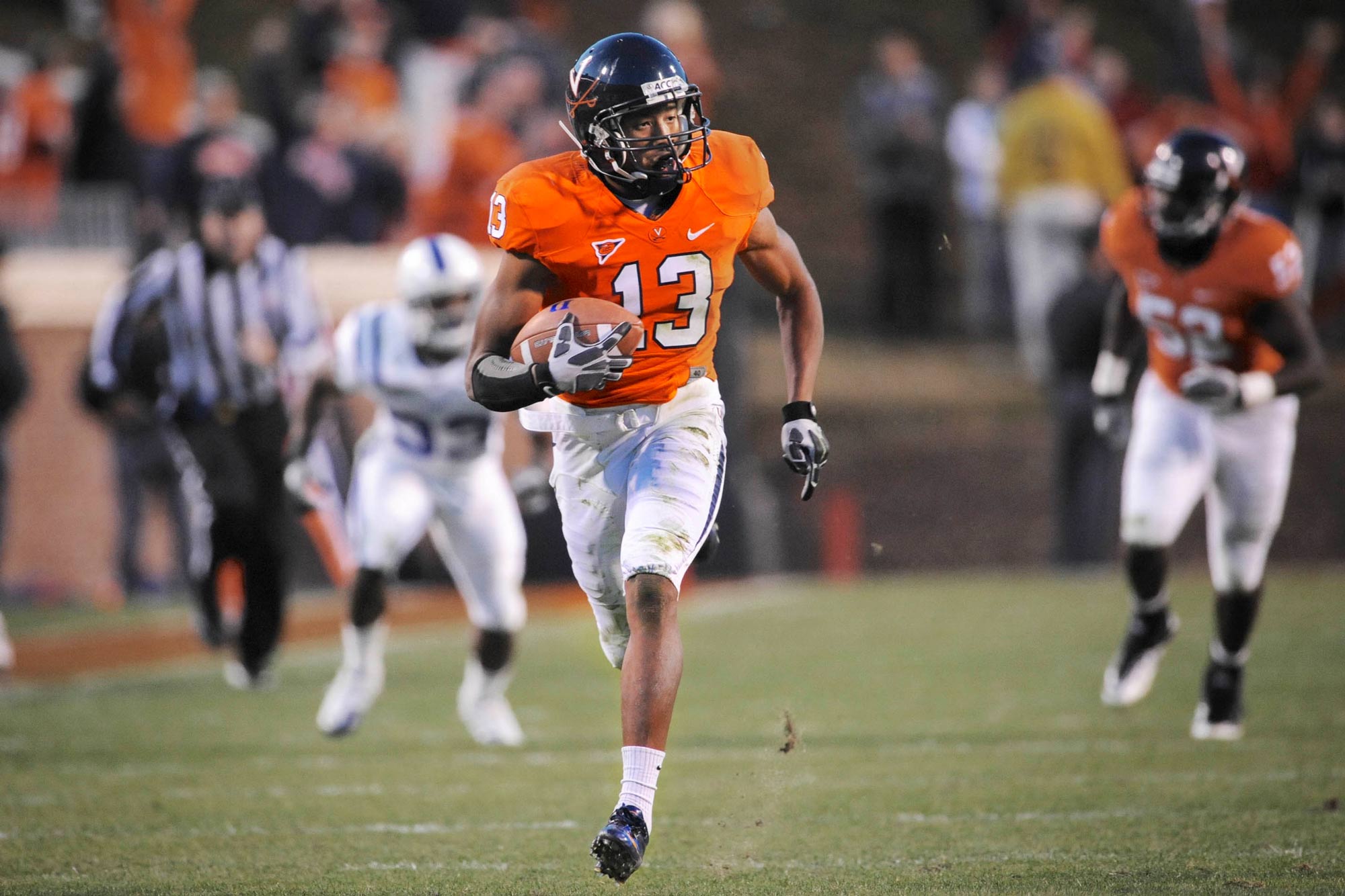 Minnifield playing football in his UVA uniform