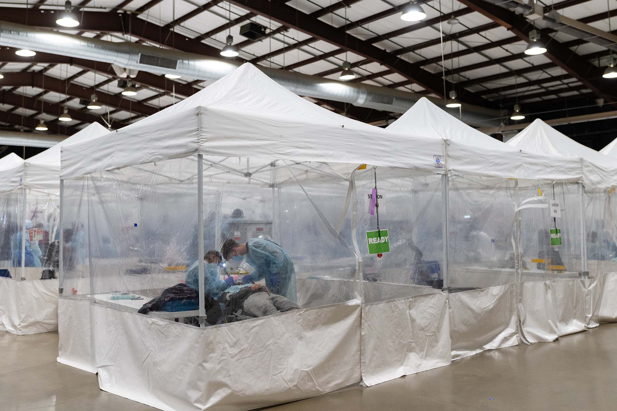 A warehouse full of tents for each temporary patient room