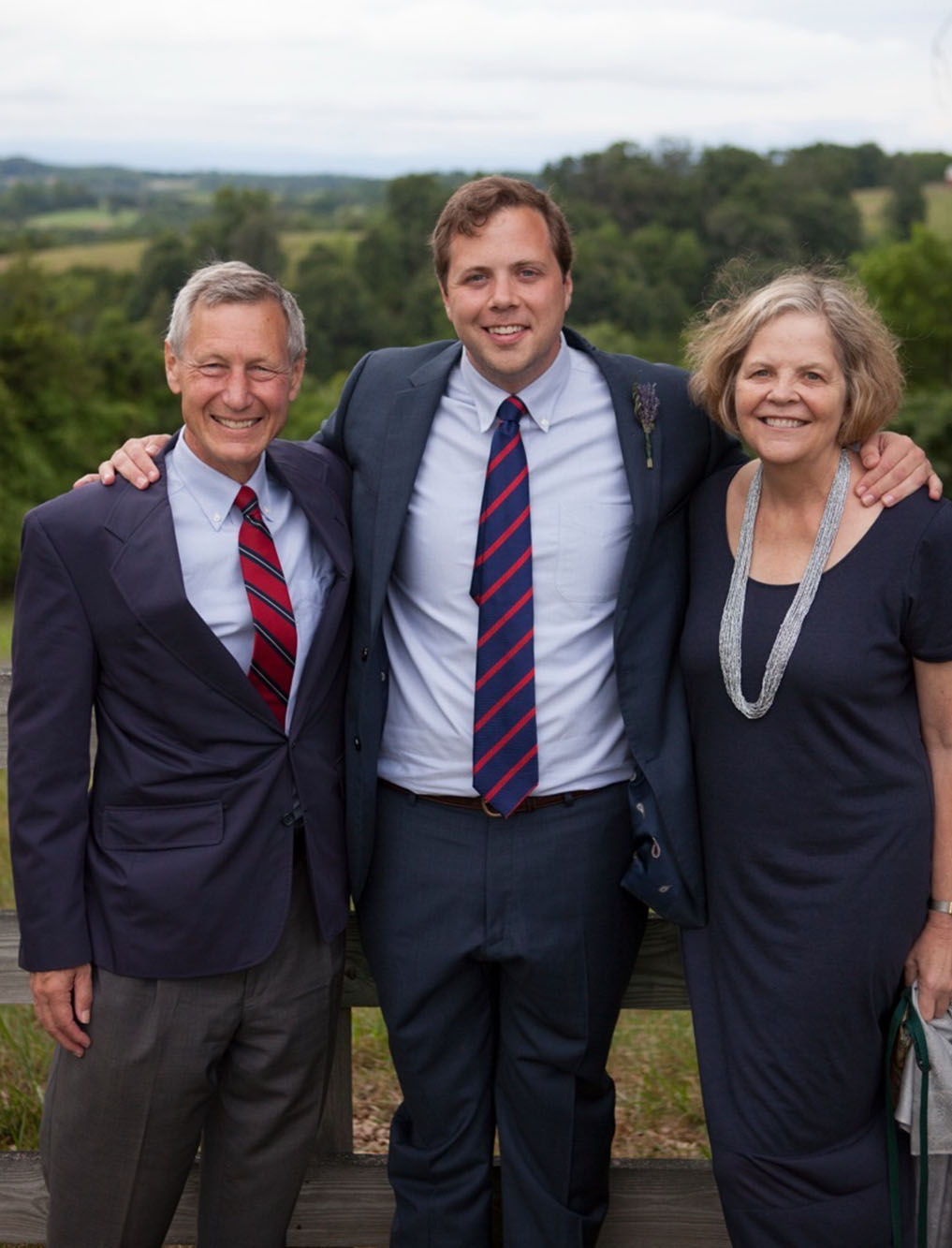Portrait of Richard Minturn, left, with his son, Jake, and wife Suzanne Freeman.