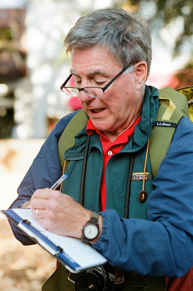 Active shot of Michael Duane taking notes