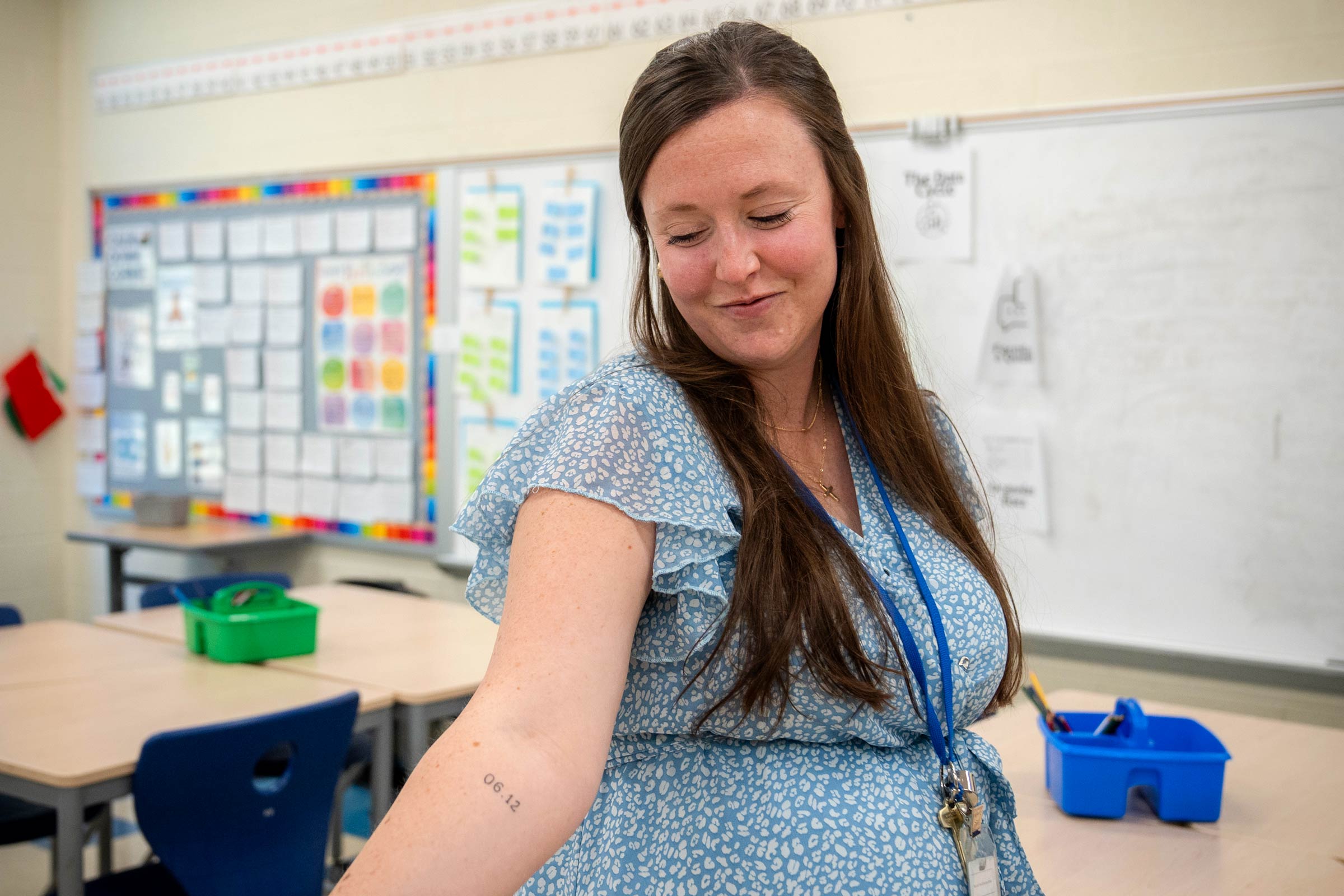 Jessica Ream shows the tattoo that memorializes her wedding day and the day she survived her cardiac arrest. 