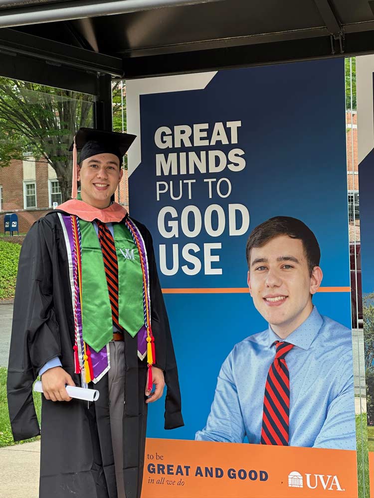 Portrait of GianGrasso wearing a graduation gown.
