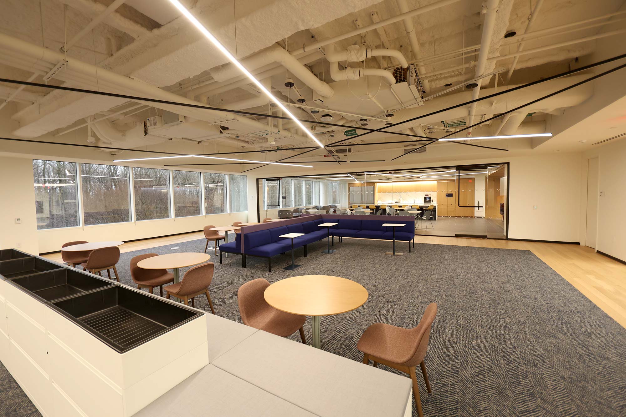 Portrait of the Inova Center for Personalized Health campus, showcasing six classrooms and open spaces designed for student and professor collaboration