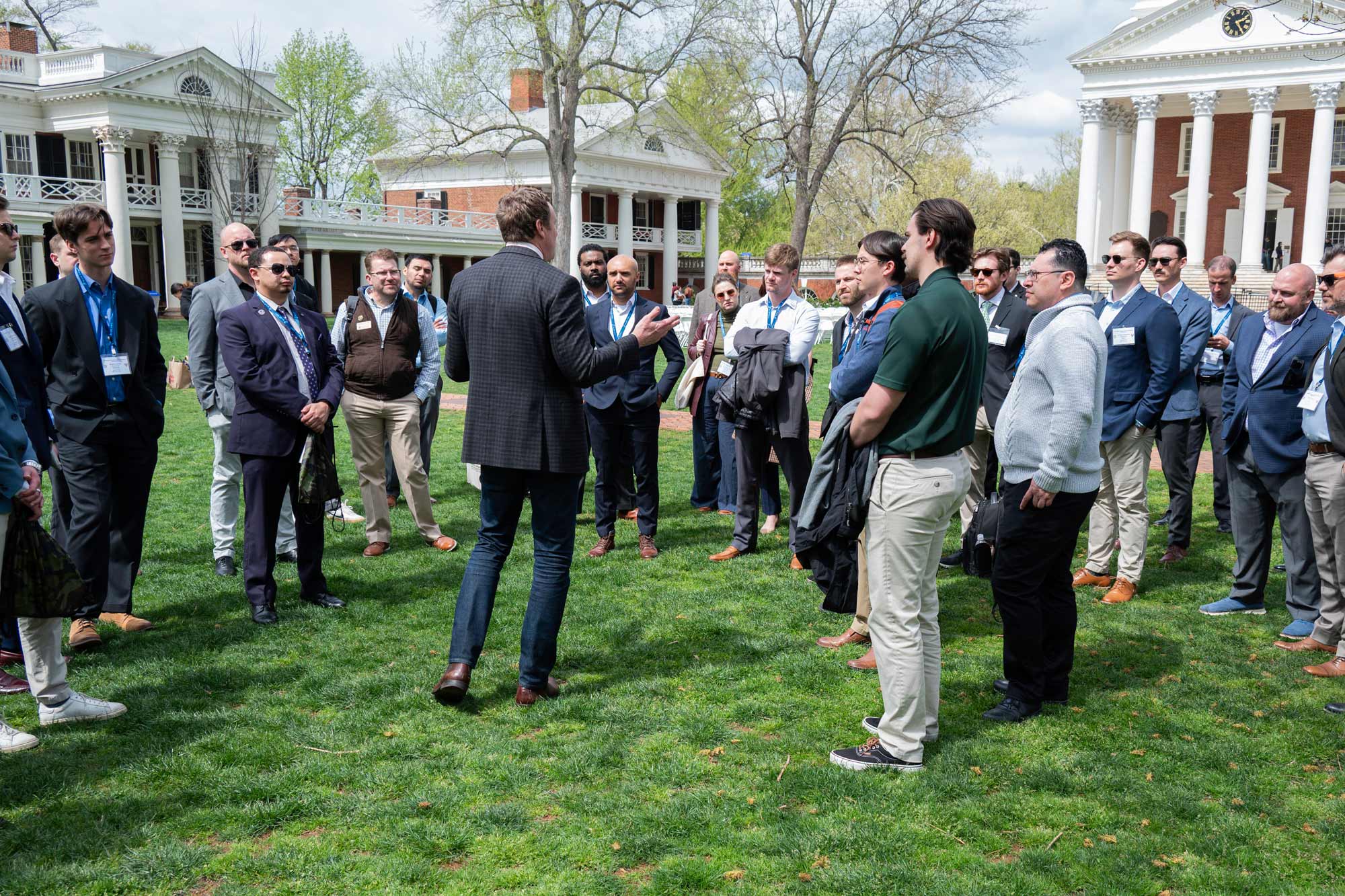 An architectural tour of the Academic Village for mMembers of the Ivy League Veterans Council led by Louis Nelson