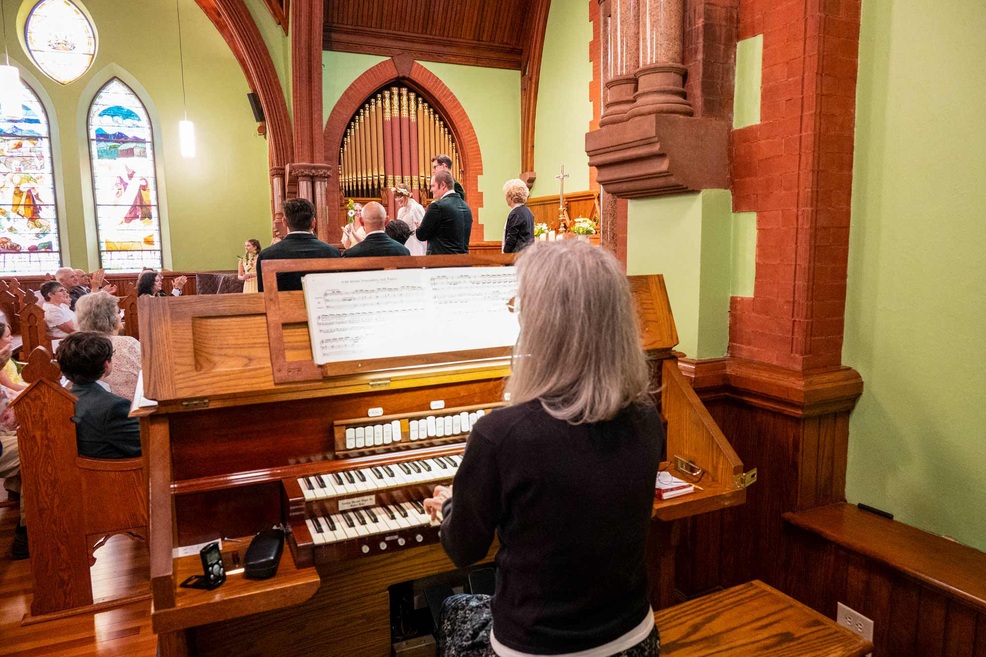 Barbara Moore seated at the UVA Chapel organ