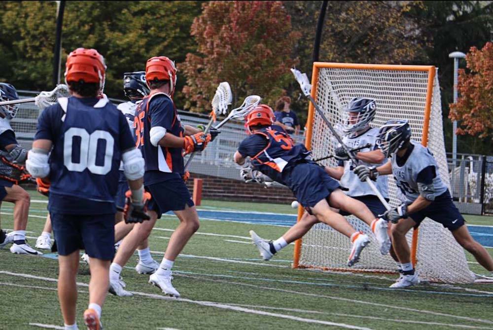 UVA lacrosse players in action