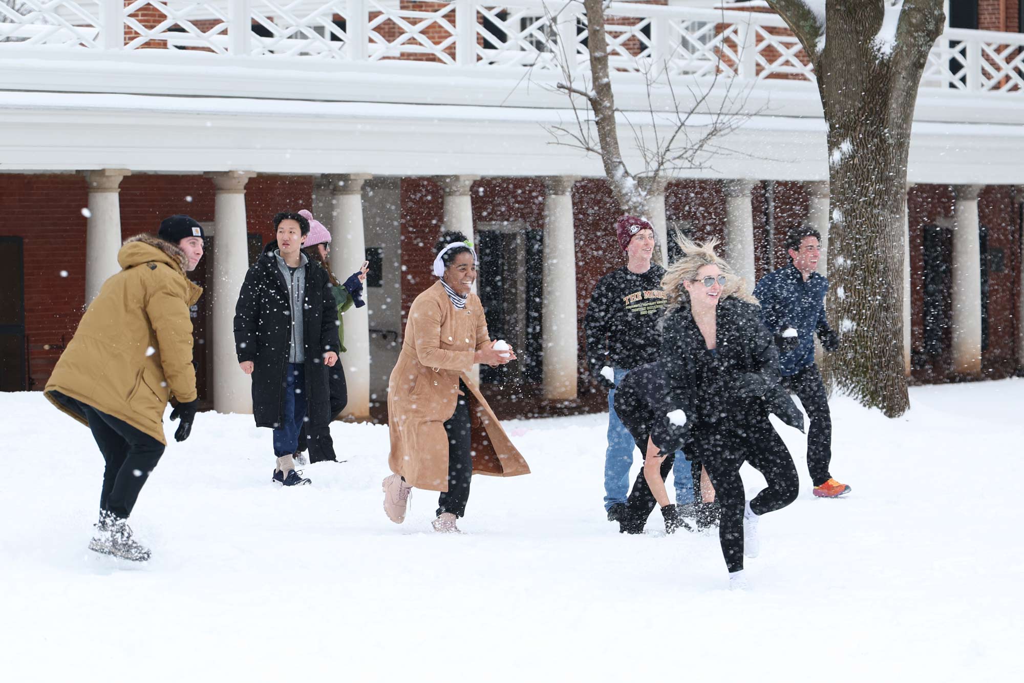 Students having a snow ball fight