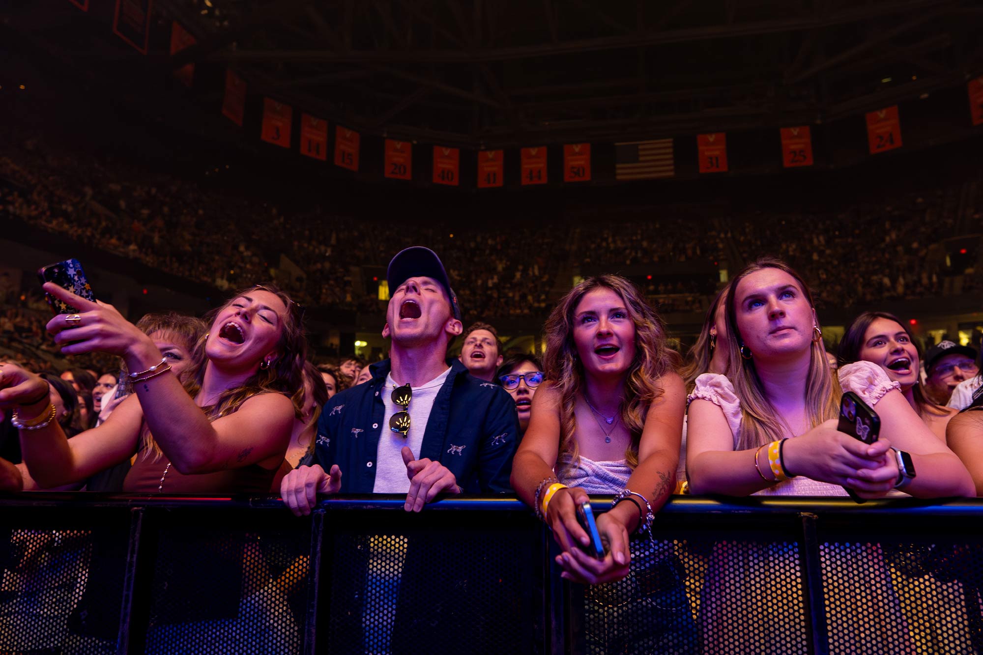 an audience-level view from the front row of John Paul Jones Arena during the Tyler Childers concert