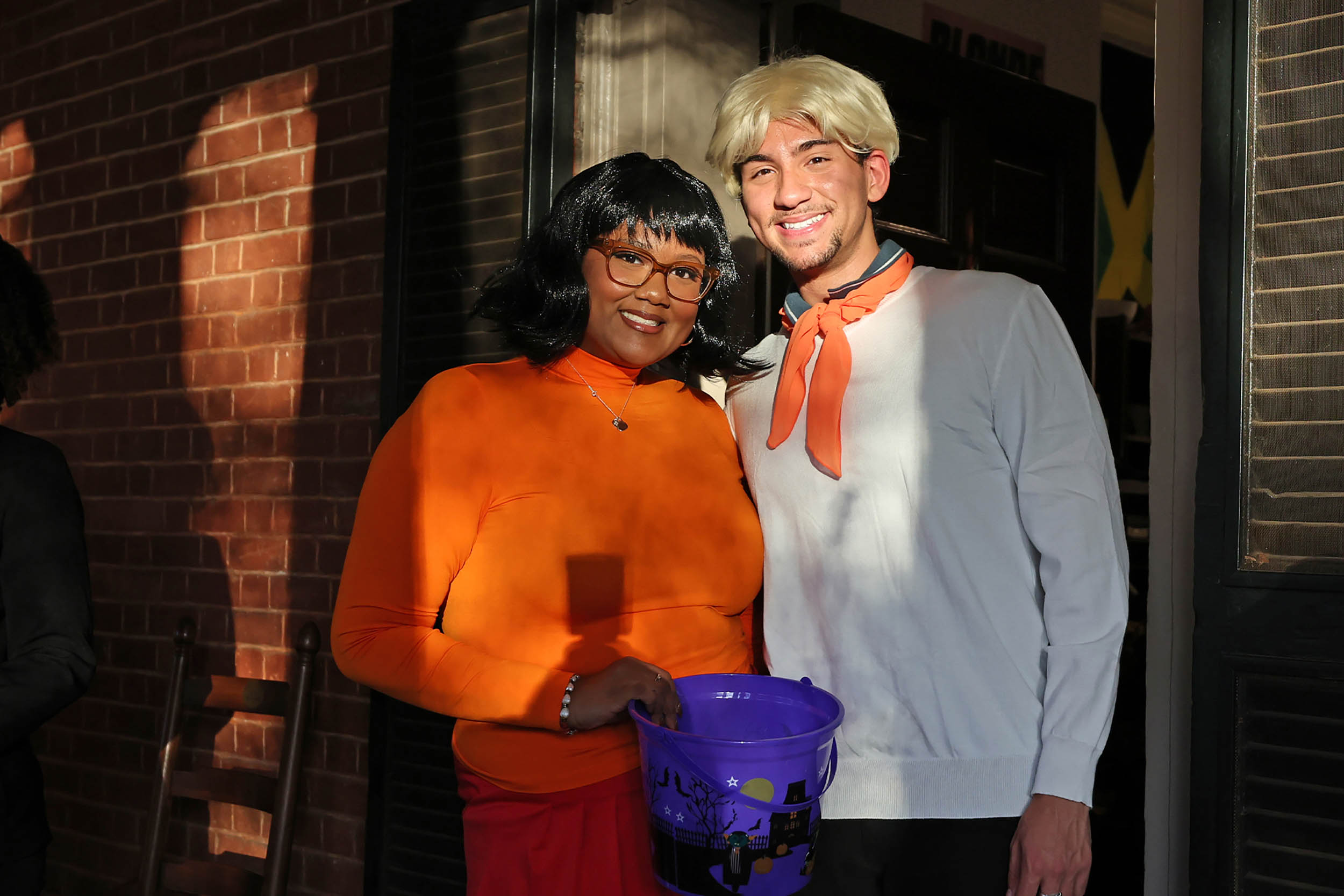 Two students dressed up as Fred and Velma from Scooby Doo