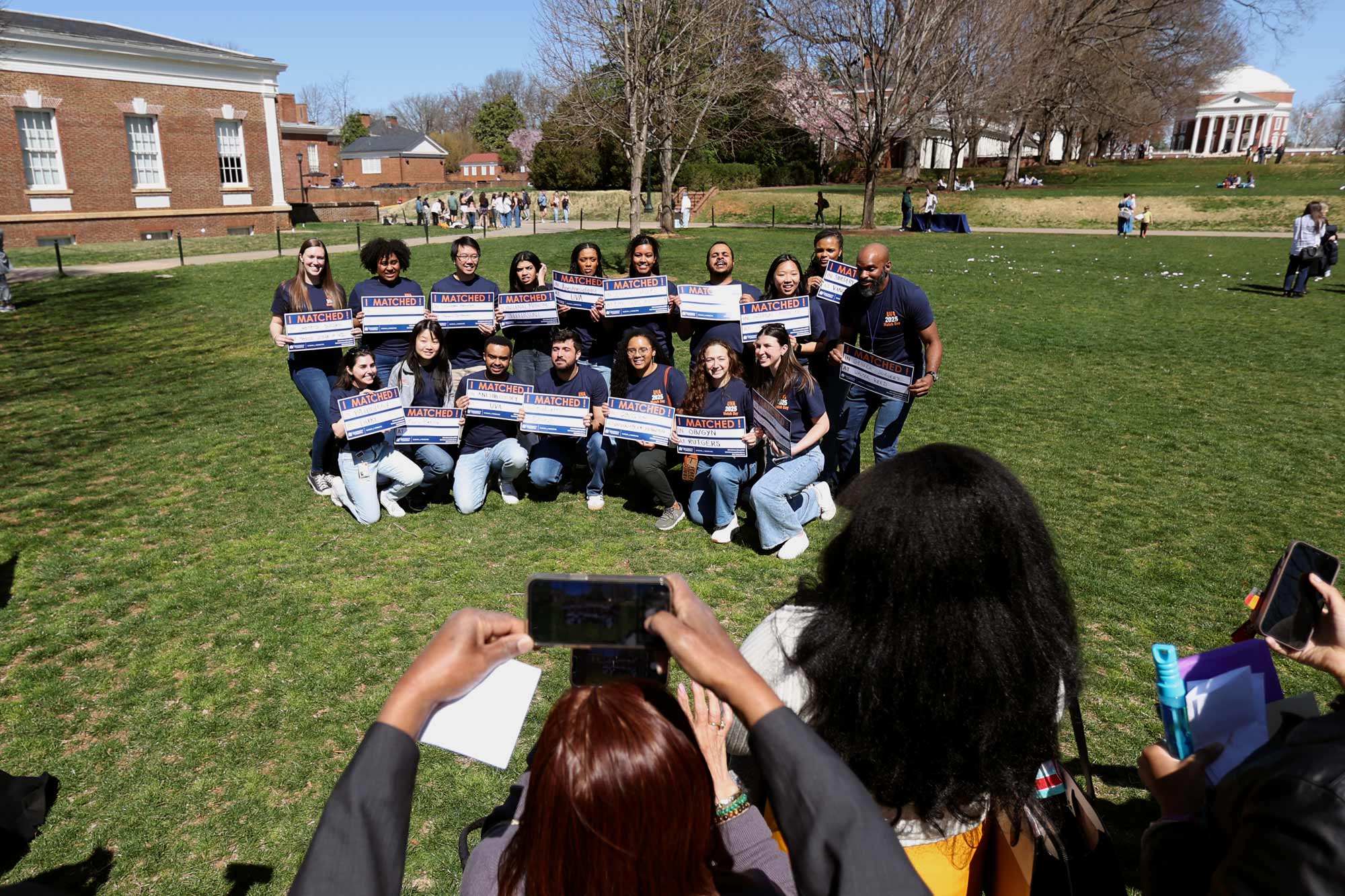 Group shot of students holding their Match signs