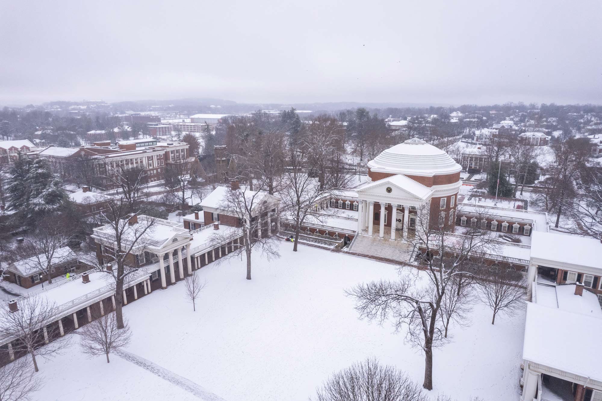 Side aerial of the Rotunda and Lawn covered in snow