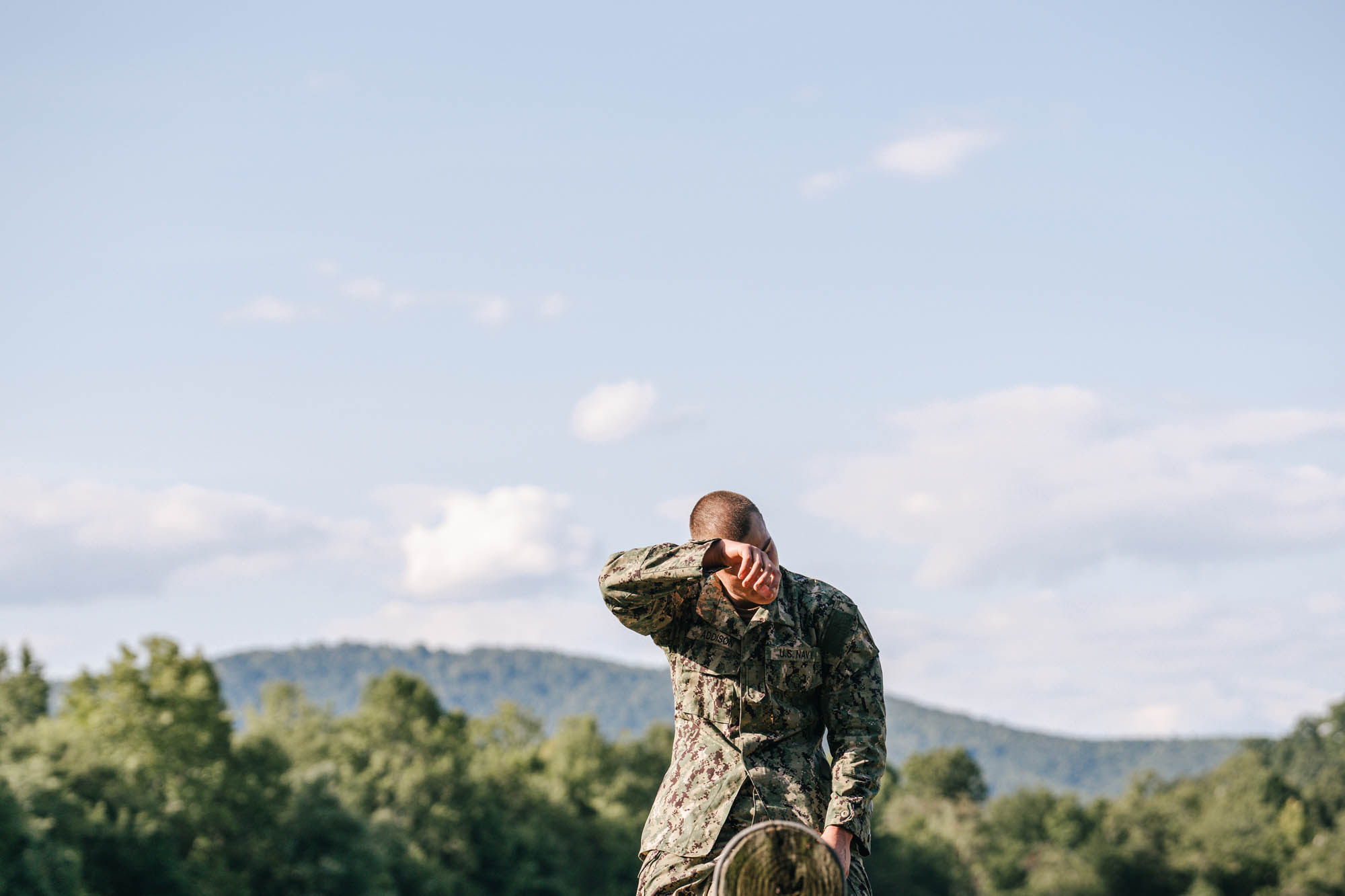 ROTC member removes hat