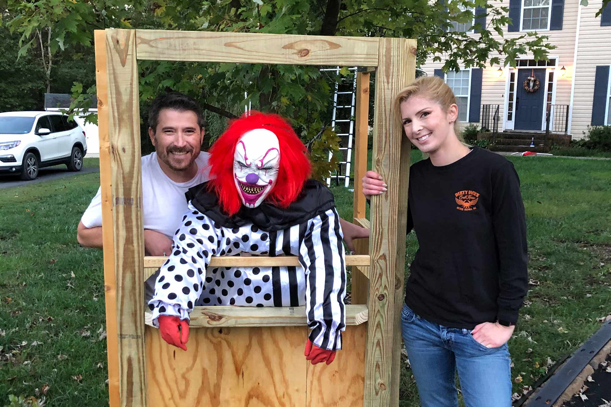 The Mingledorffs constructing a clown booth.