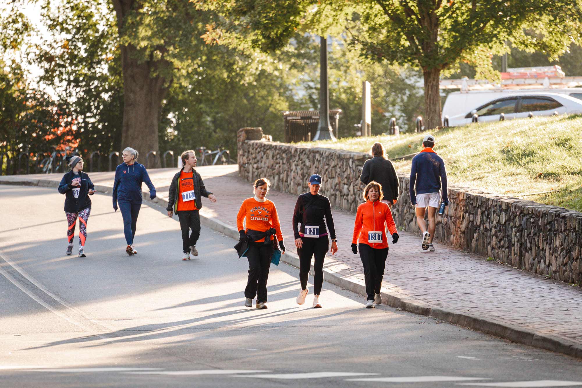 A group of walkers strolls by during the race