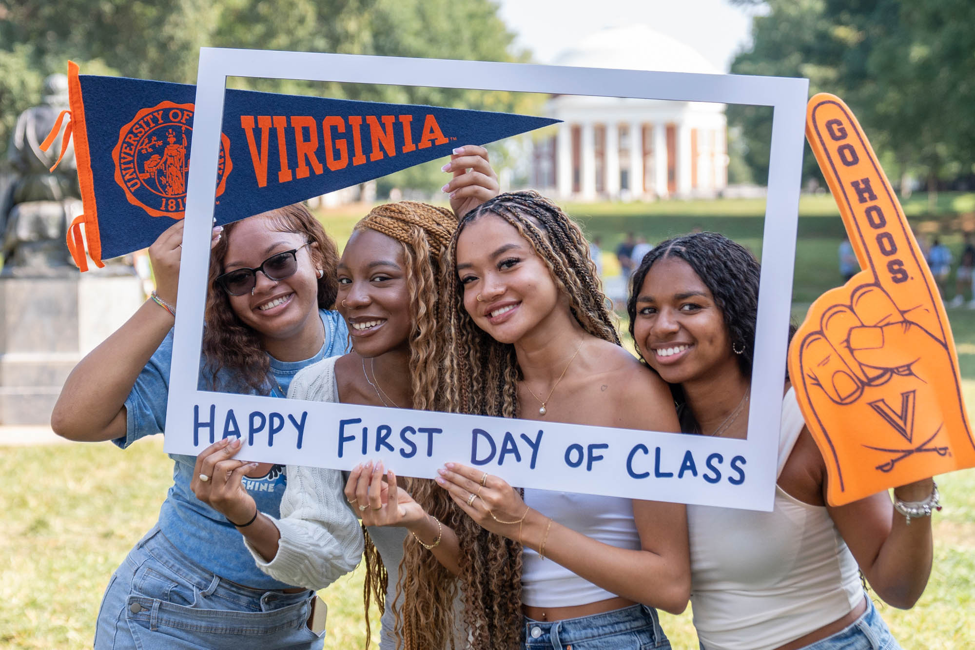 Students smile through a first day of school frame