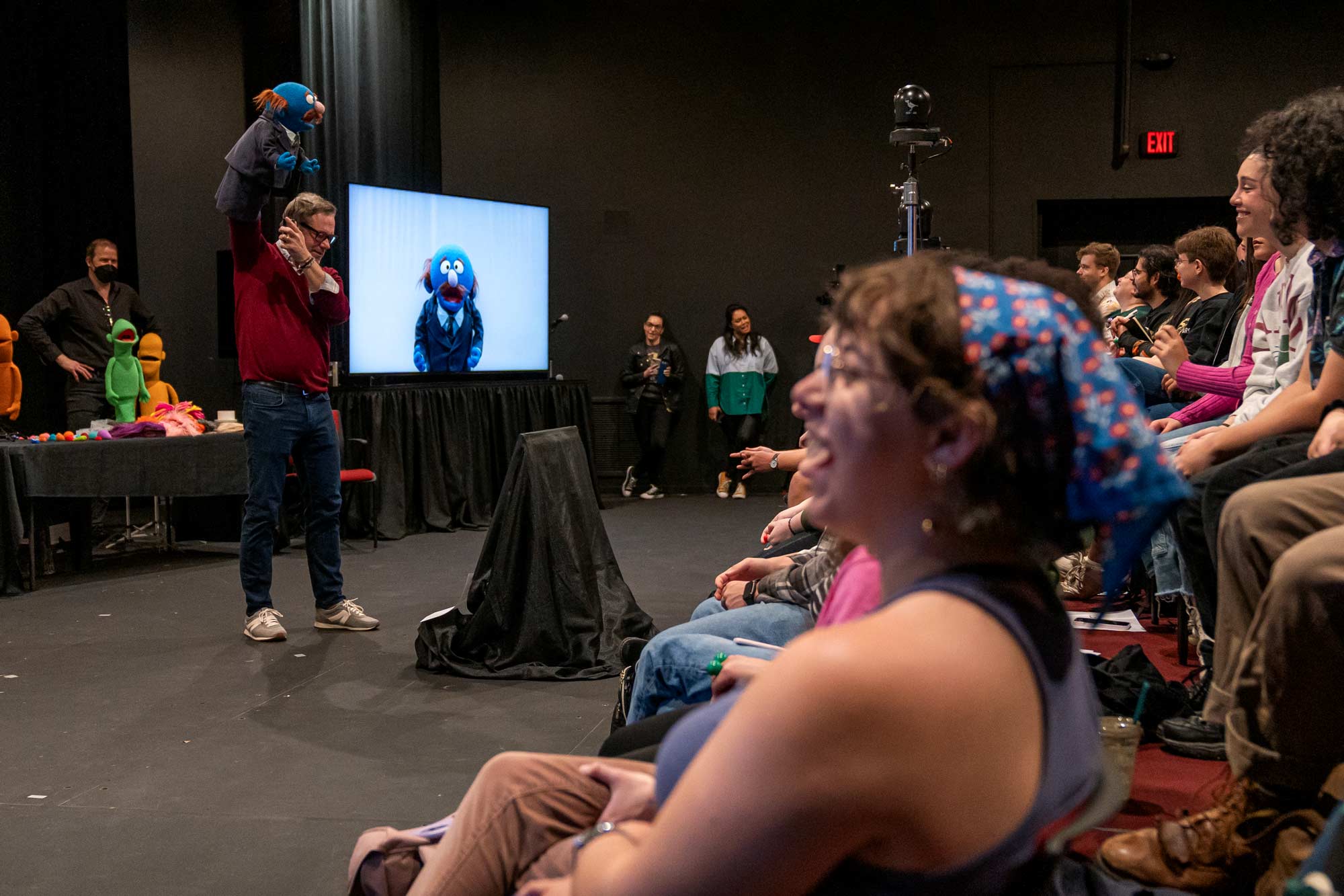 Puppeteer demonstration in front of crowd